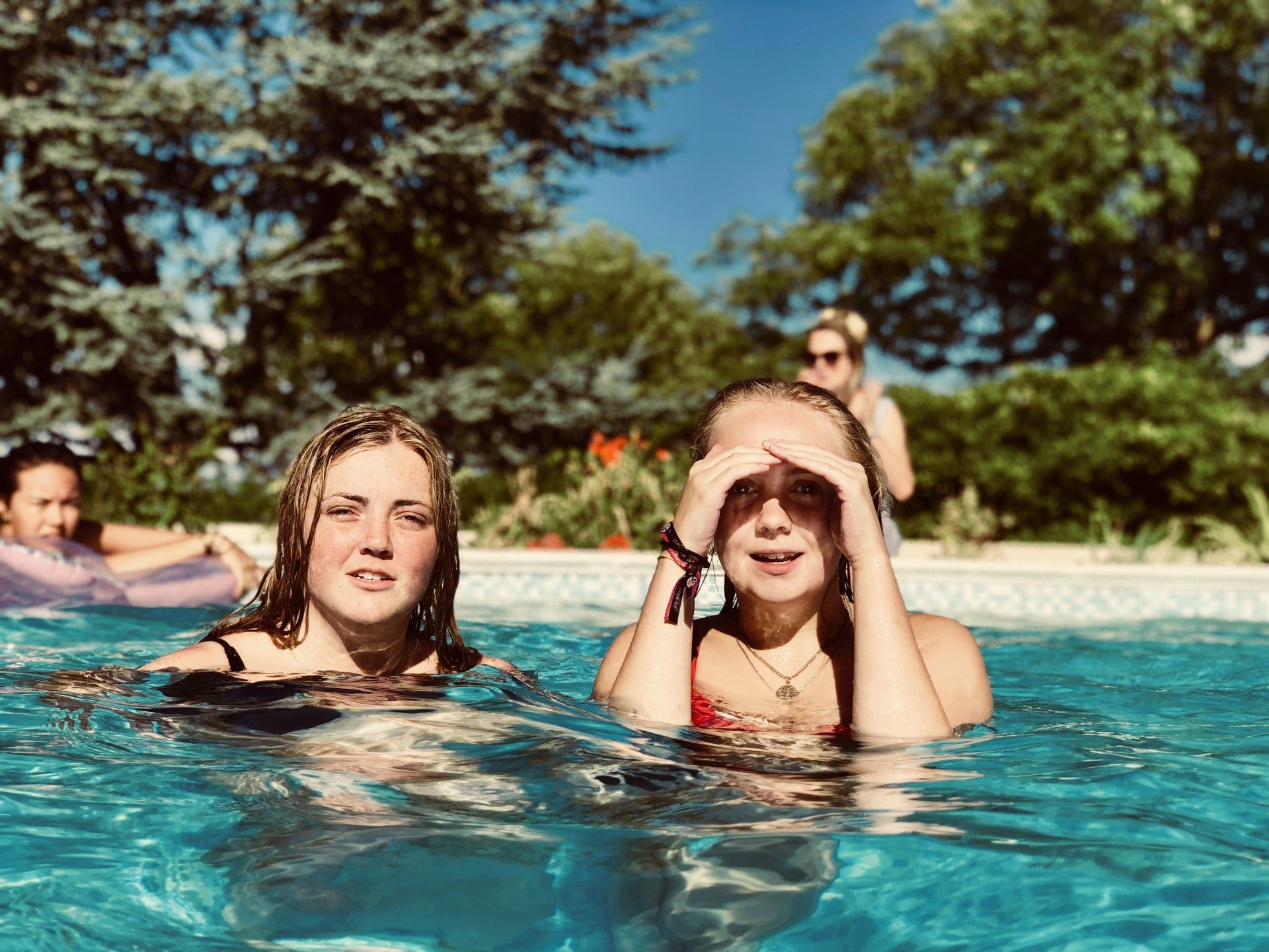 2 White Girls in a Pool During Summer Barter'sTravelnet
