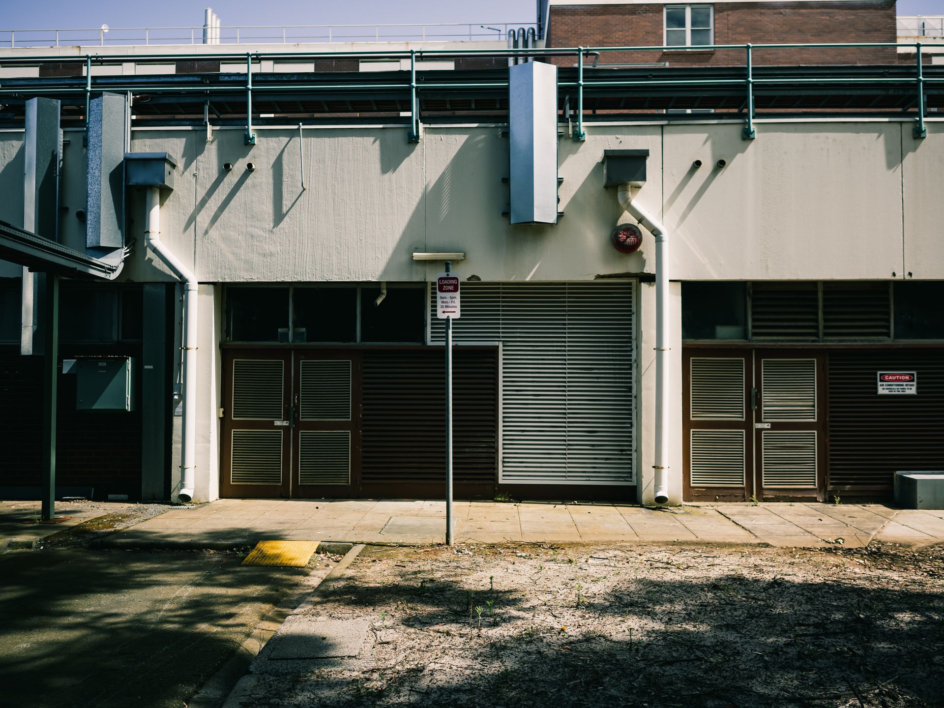 A building with a no parking sign in front of it