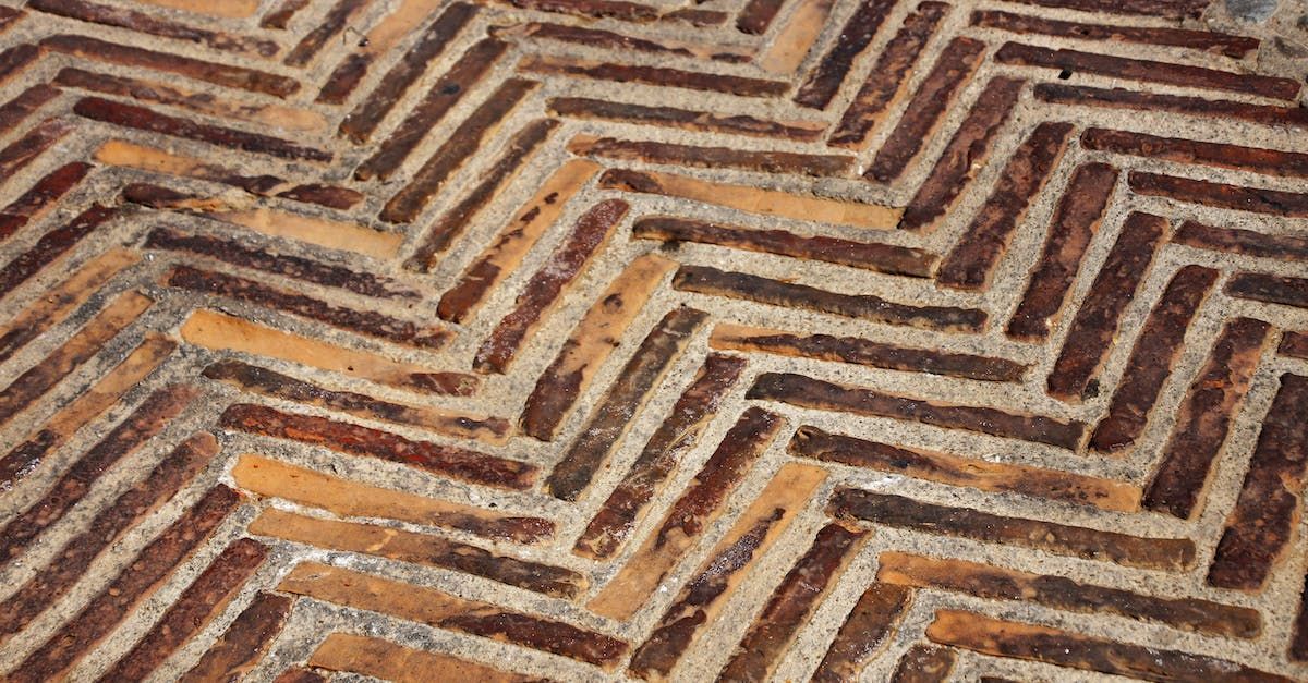 Long, thin rustic pavers in diagonal designs