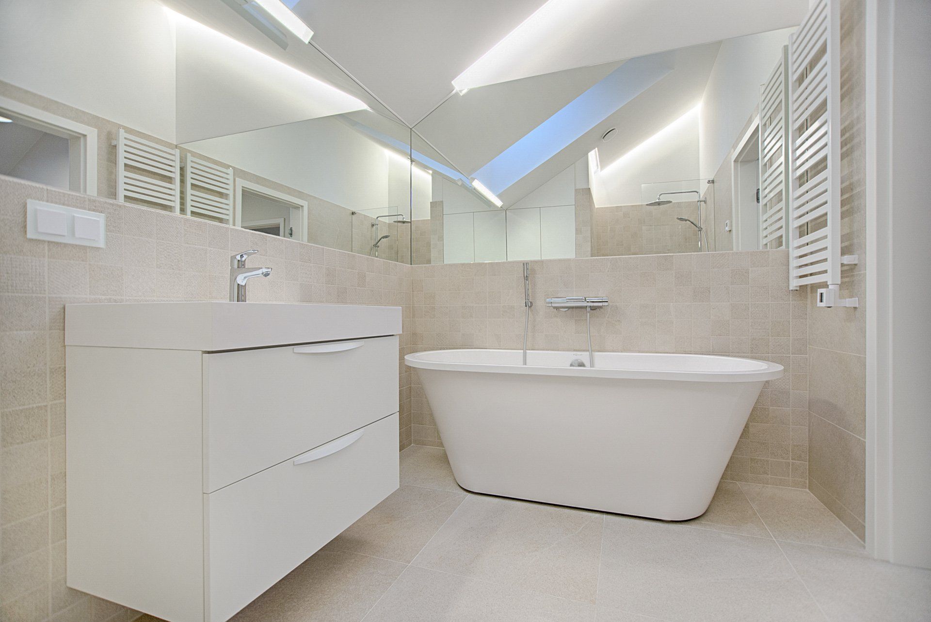 A picture of a white and ivory bathroom suite installed by Plumbers Sheffield