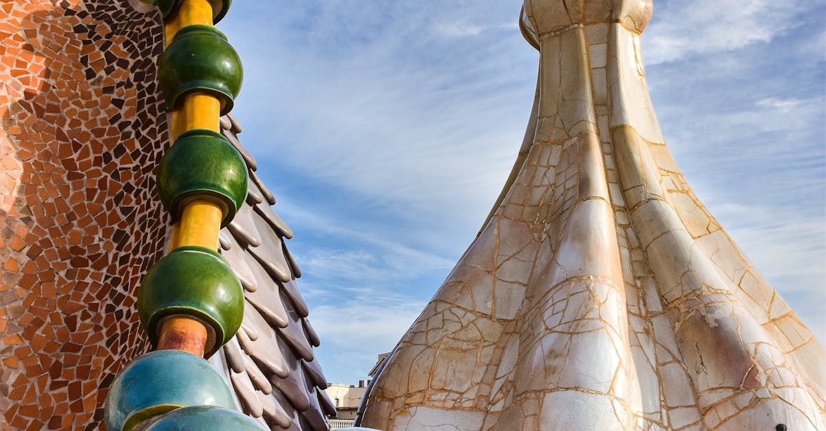A very tall building with a blue sky in the background.
