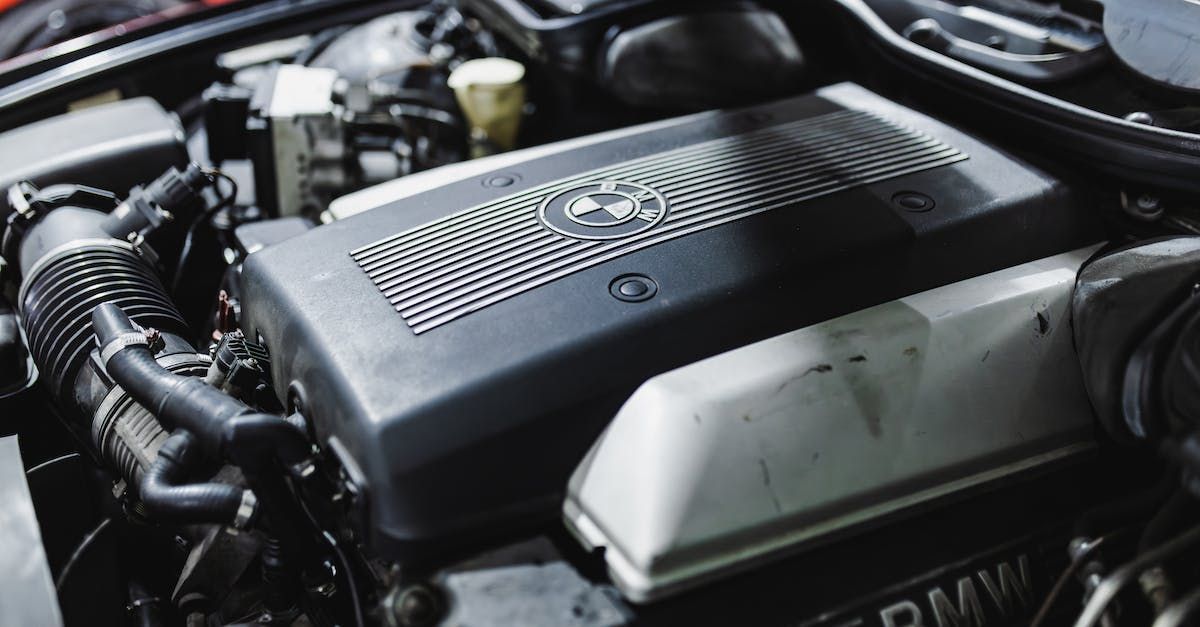 a close up of a bmw engine with the hood open .