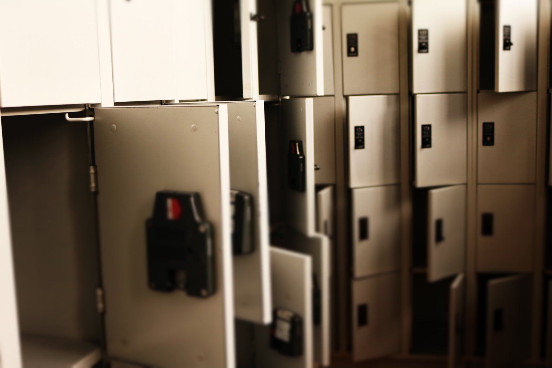 Rows of open and closed lockers