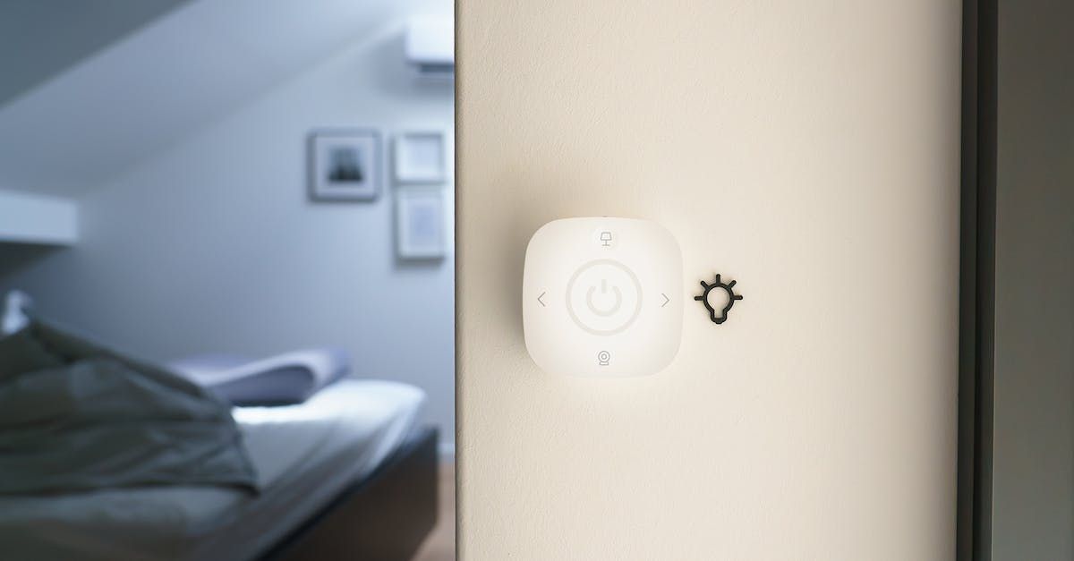 a white Smart Home remote control with a power button and a light button