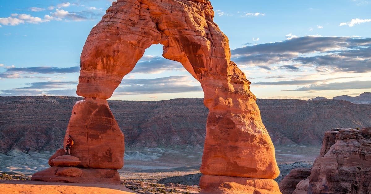 The delicate arch is a large rock formation in the desert.