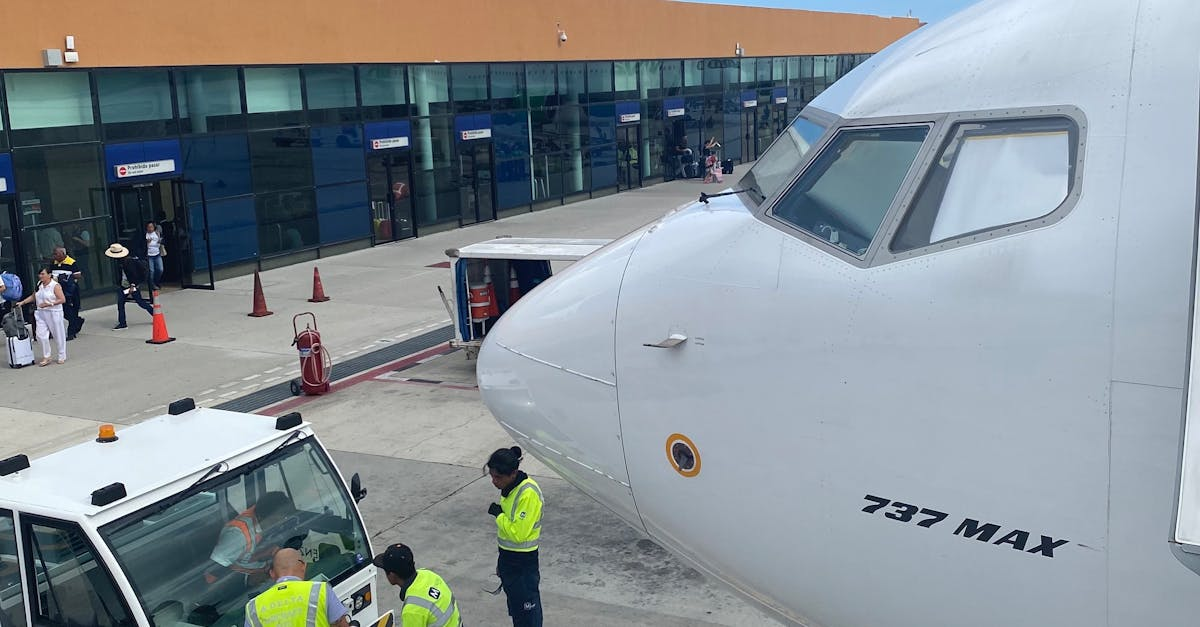 A large passenger jet is parked on the tarmac at an airport.