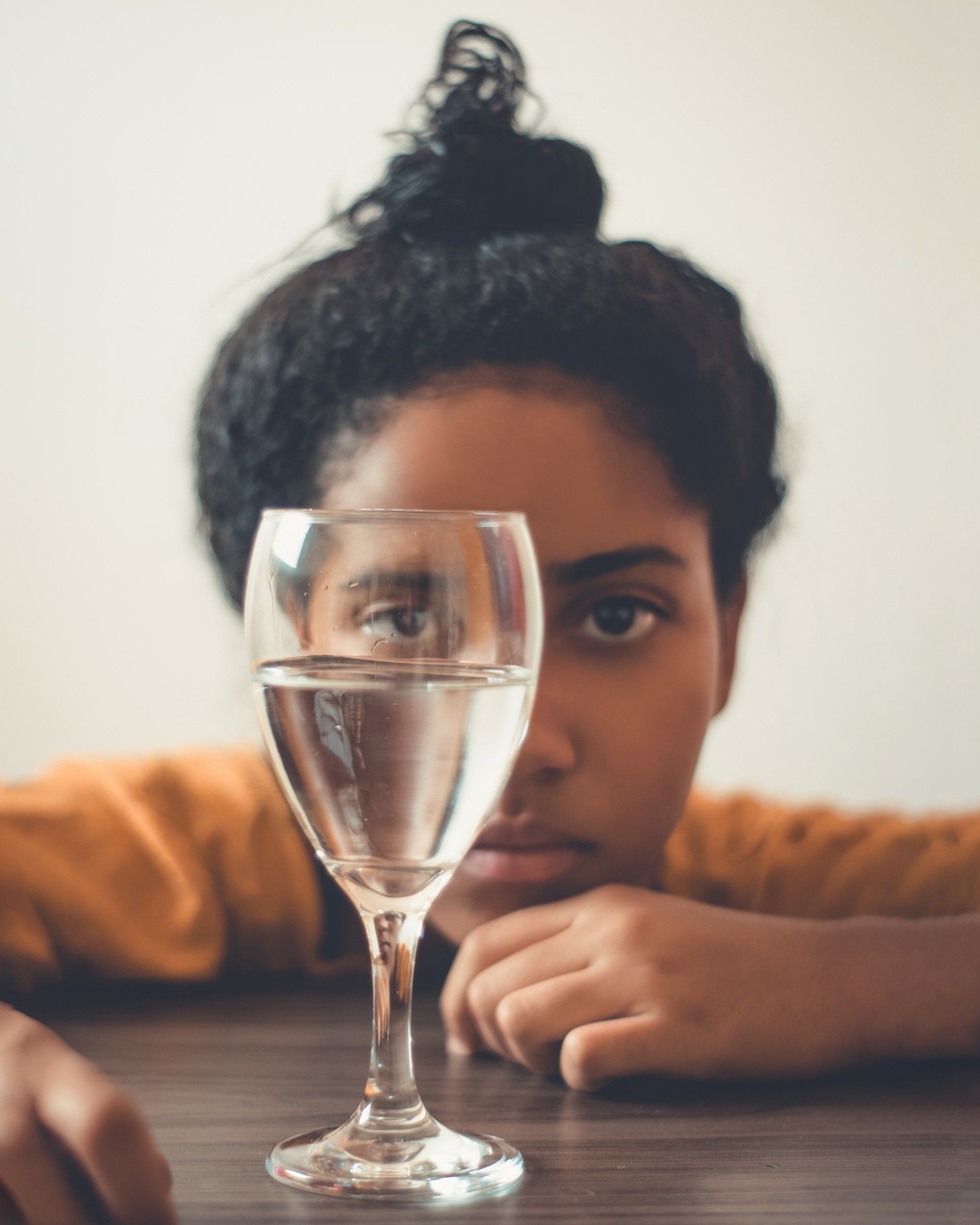 Woman staring at water and not eating