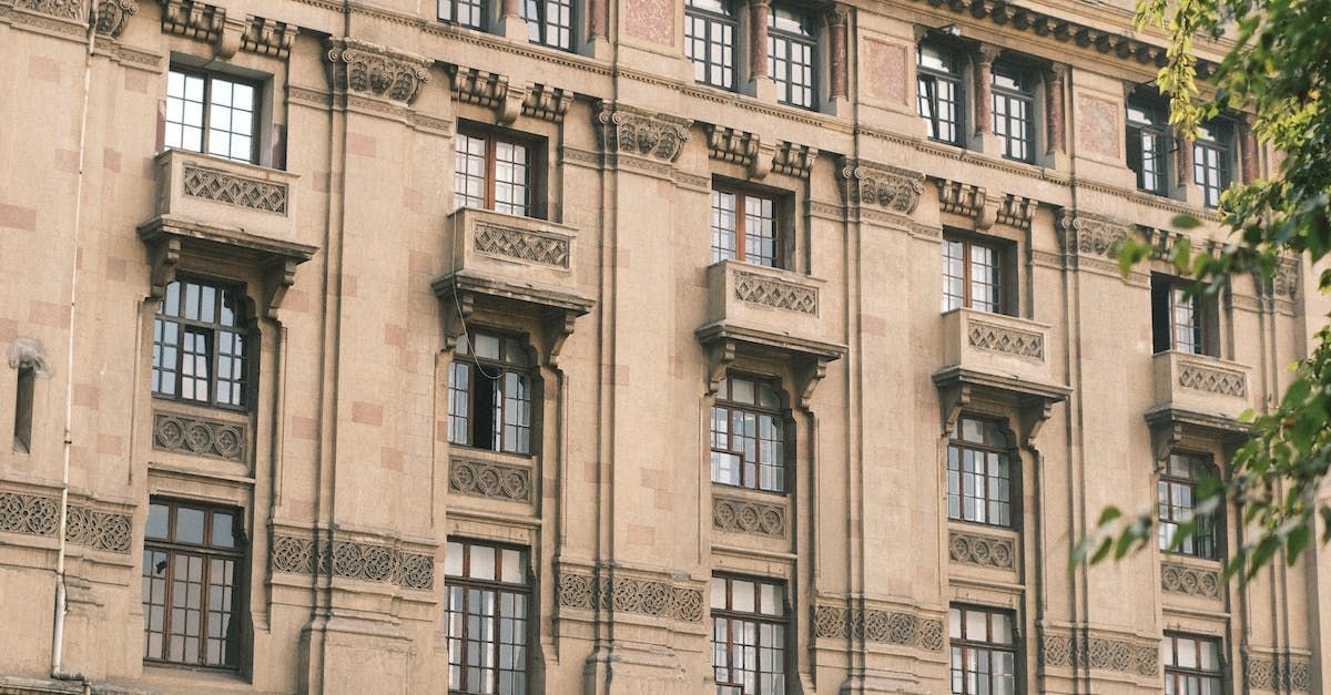 a large building with a lot of windows and balconies