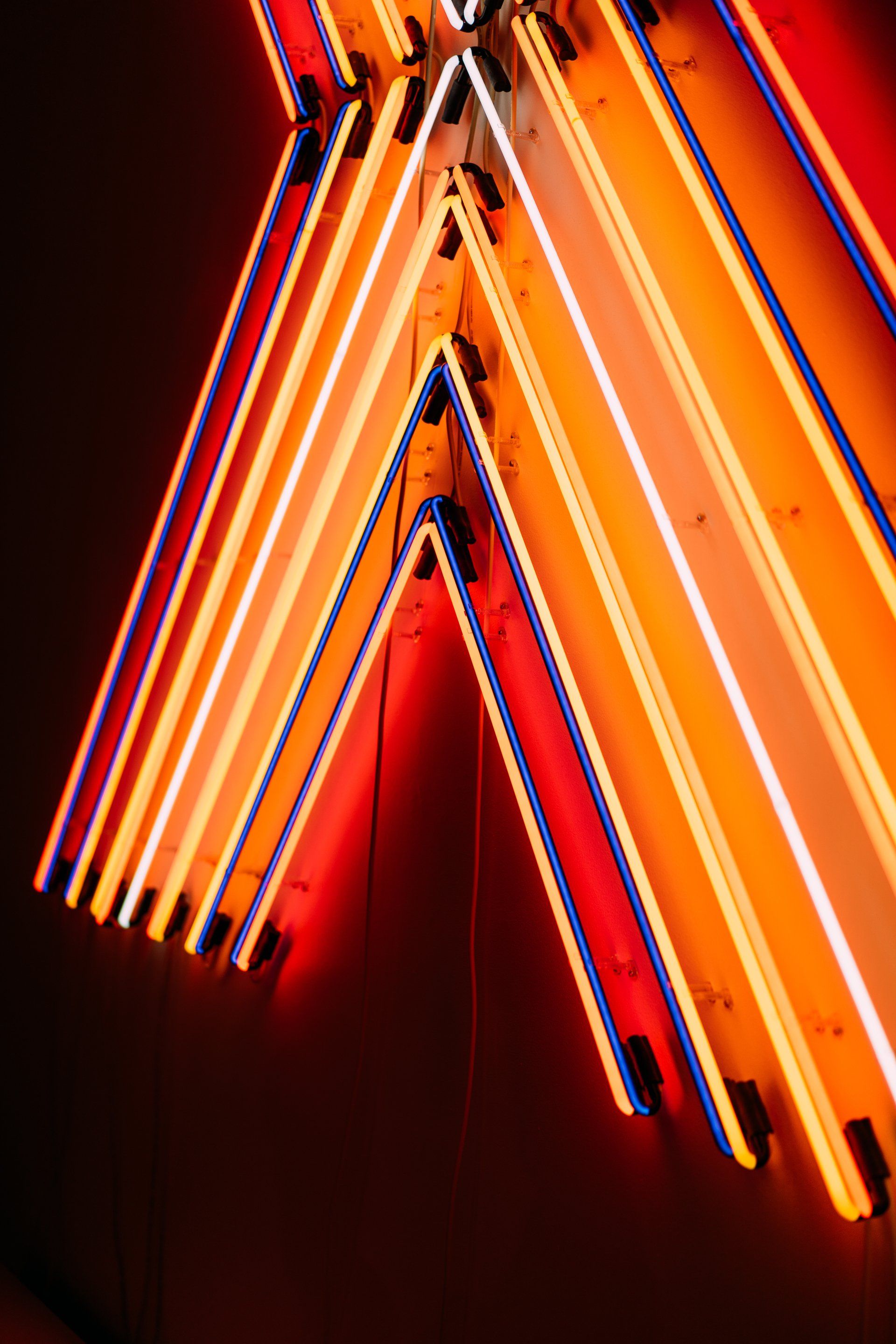 Orange neon bar lights in a V shape or mountain shape