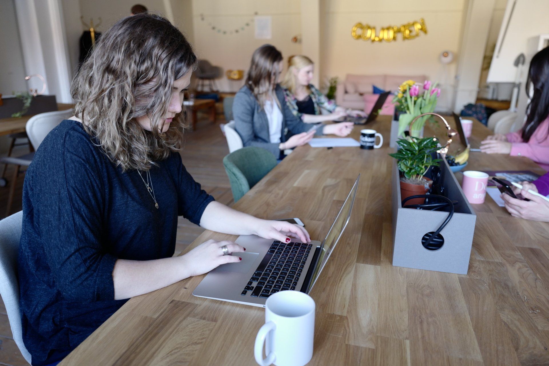women working in coworking space