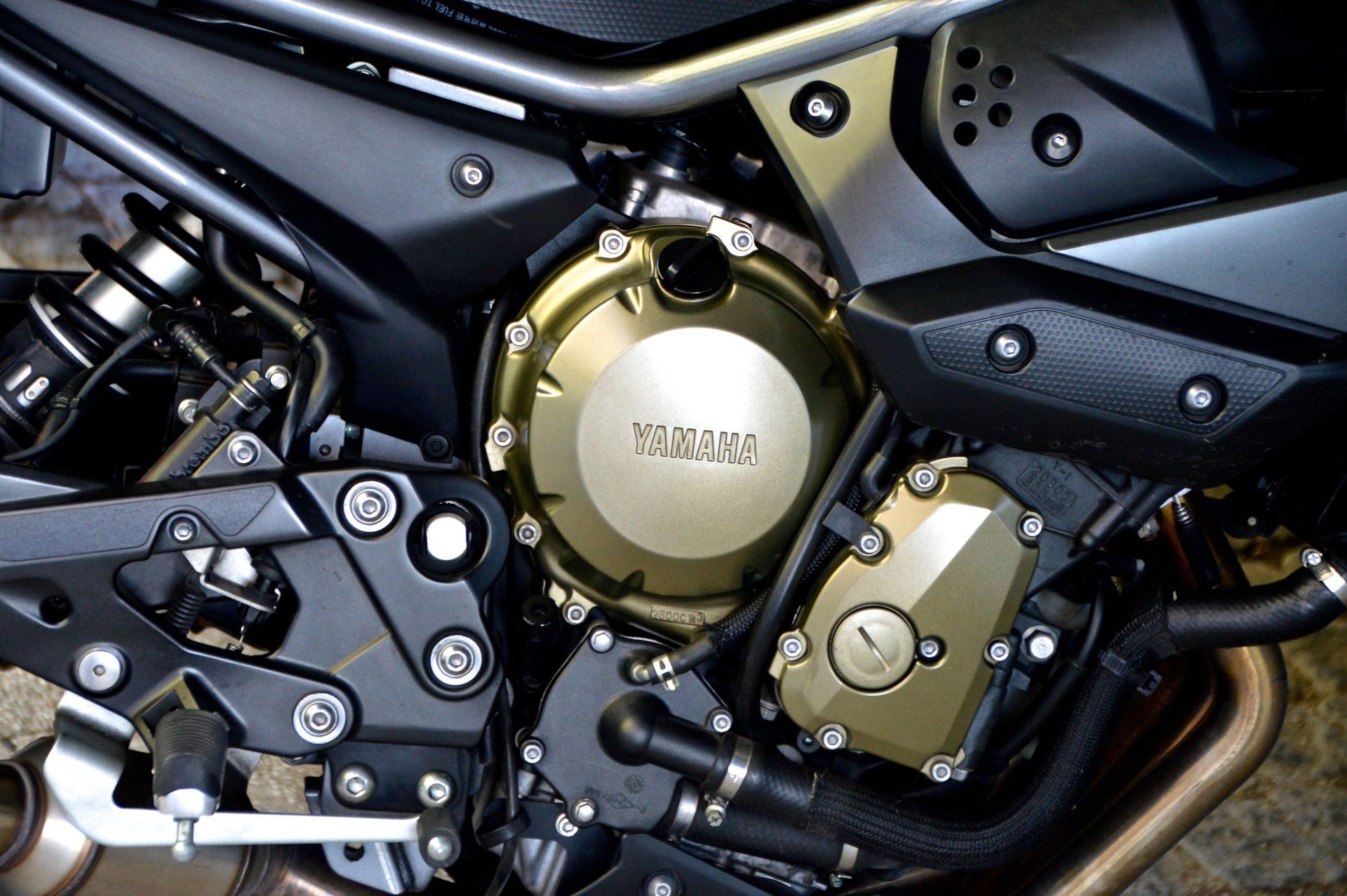 A close up of a yamaha motorcycle engine