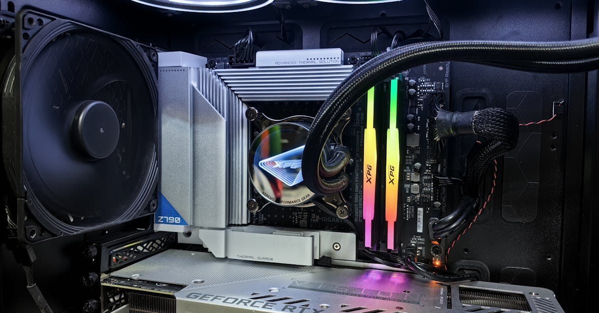 A close up of a computer with a fan and ram.