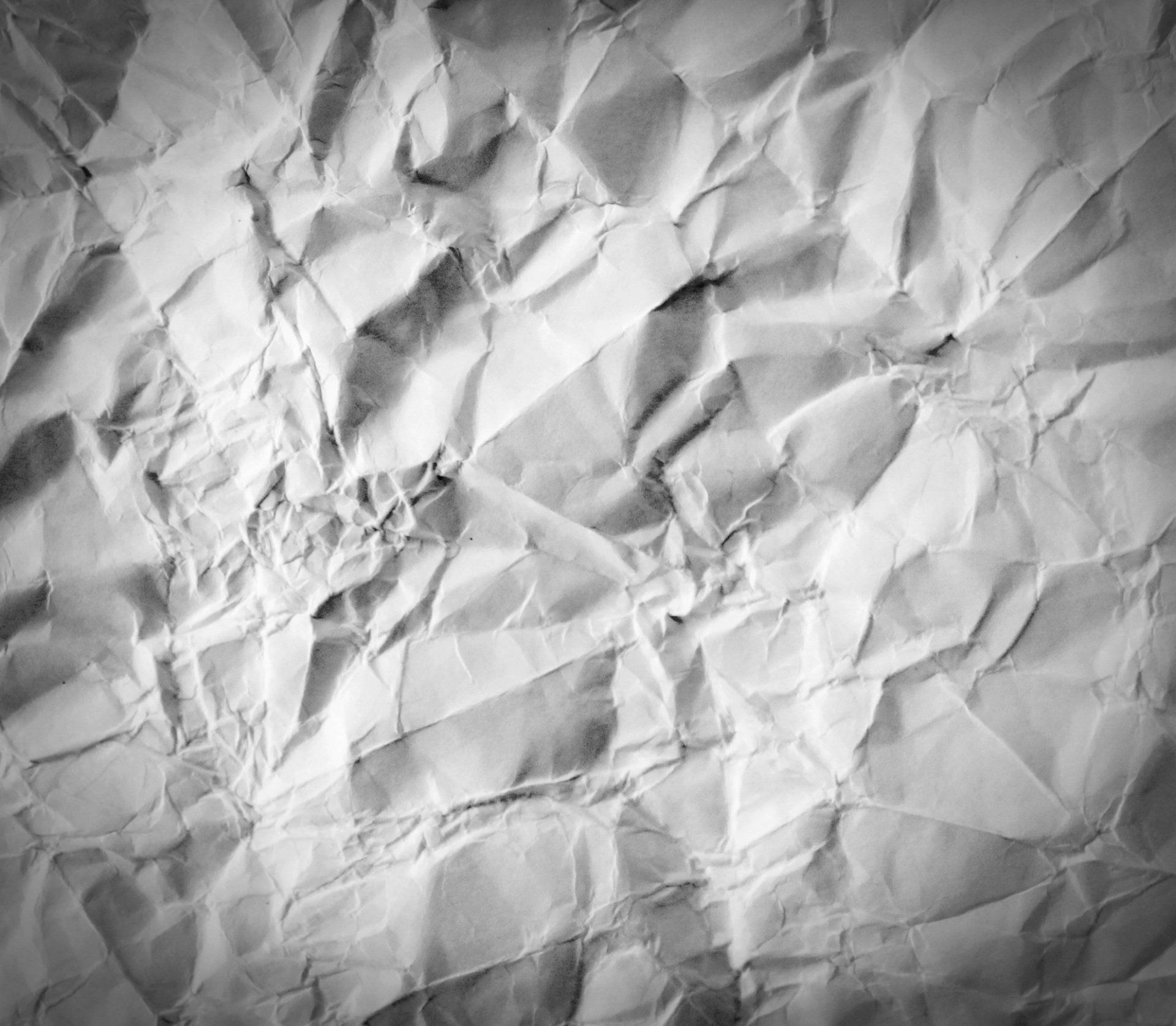 A close up of a crumpled piece of paper.
