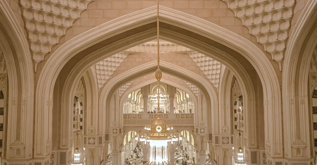 A very ornate building with a chandelier hanging from the ceiling.