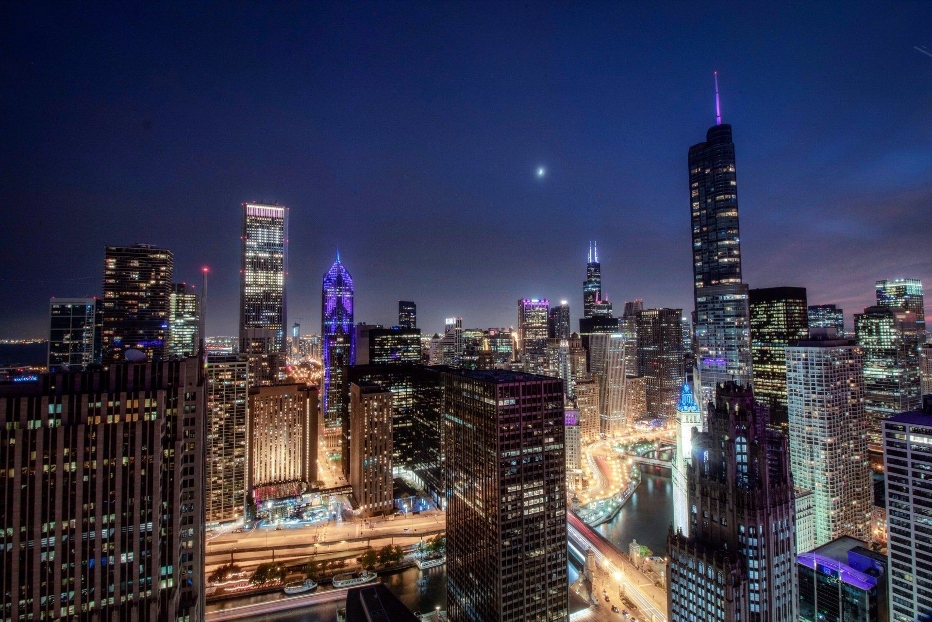 An aerial view of a city skyline at night