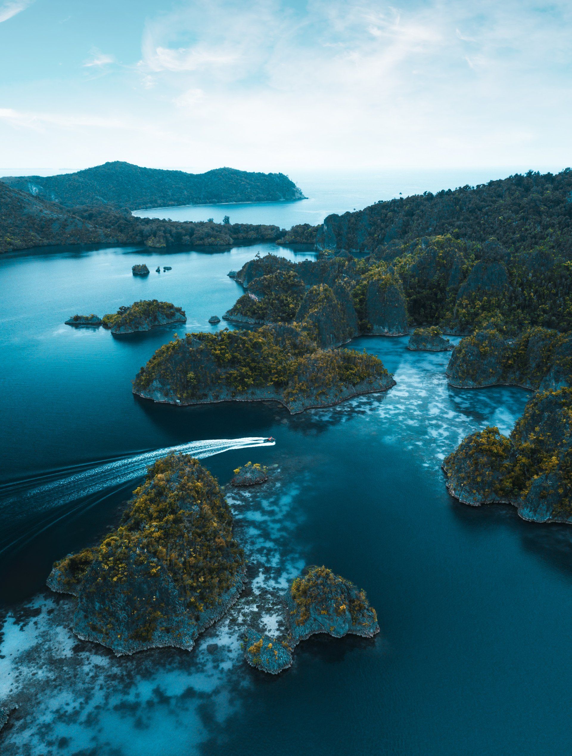 An aerial view of a large body of water surrounded by islands.