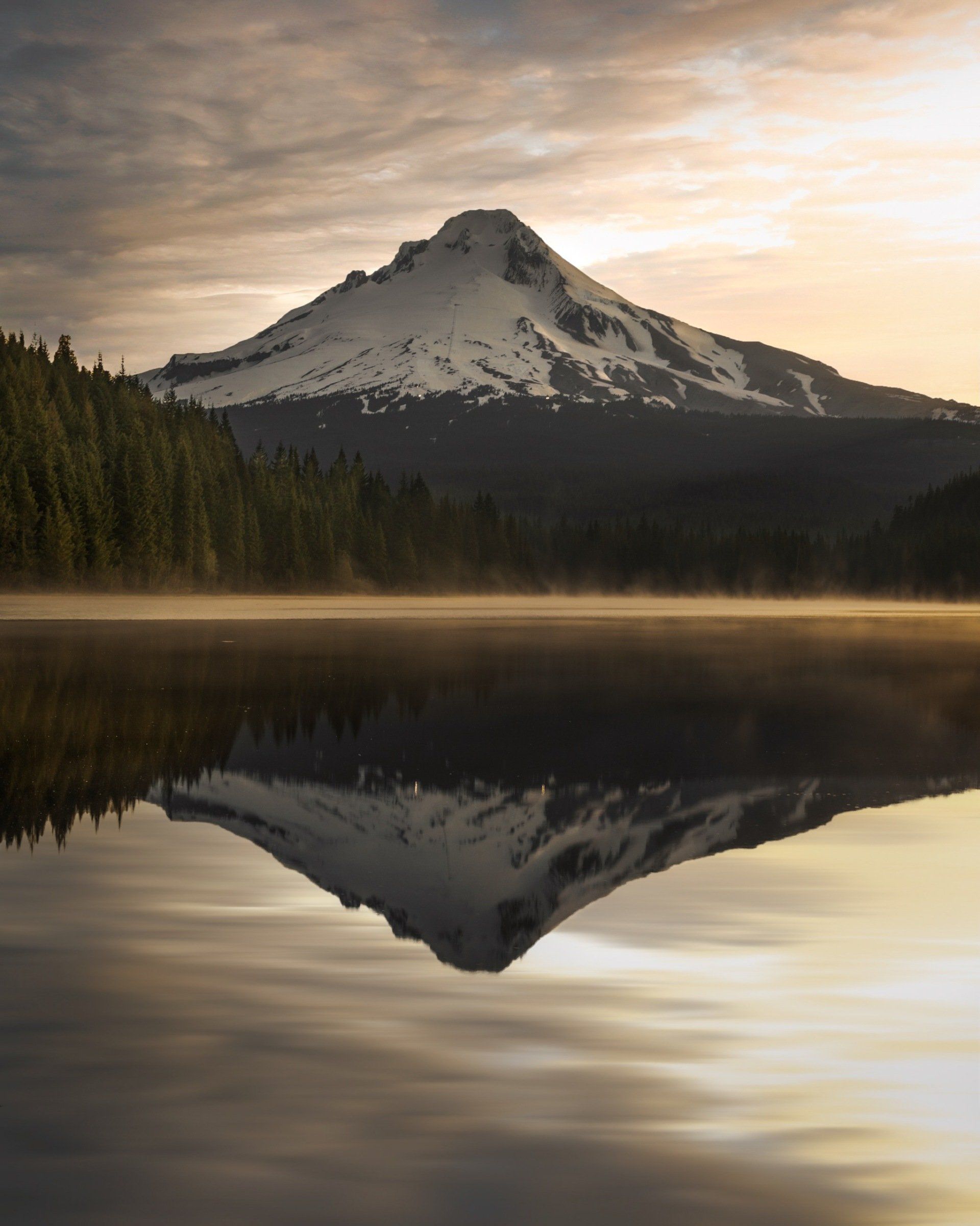 Beautiful mountain and calm lake scene - depicting the stillness of the present moment
