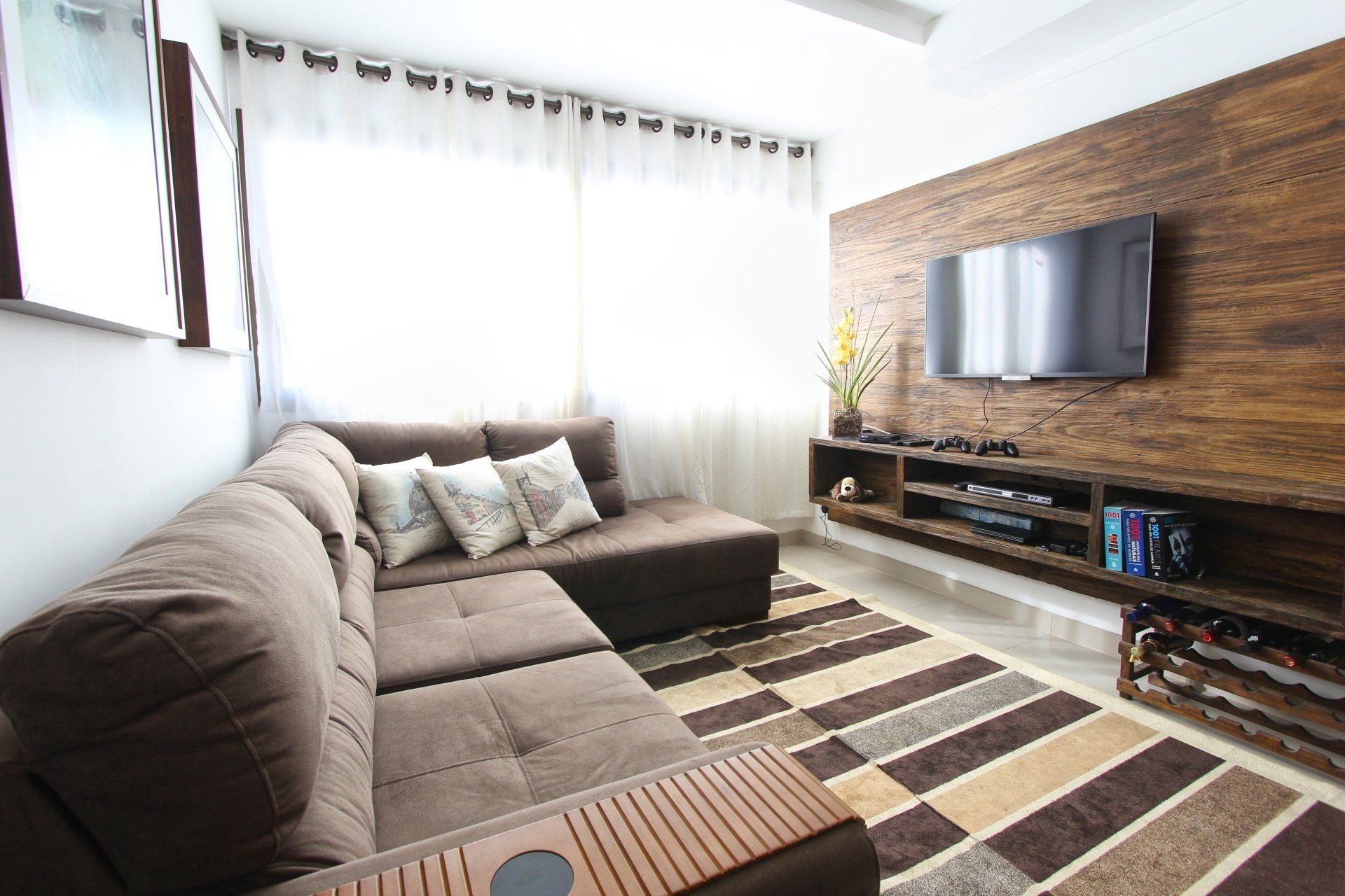 TV room with shaded curtains