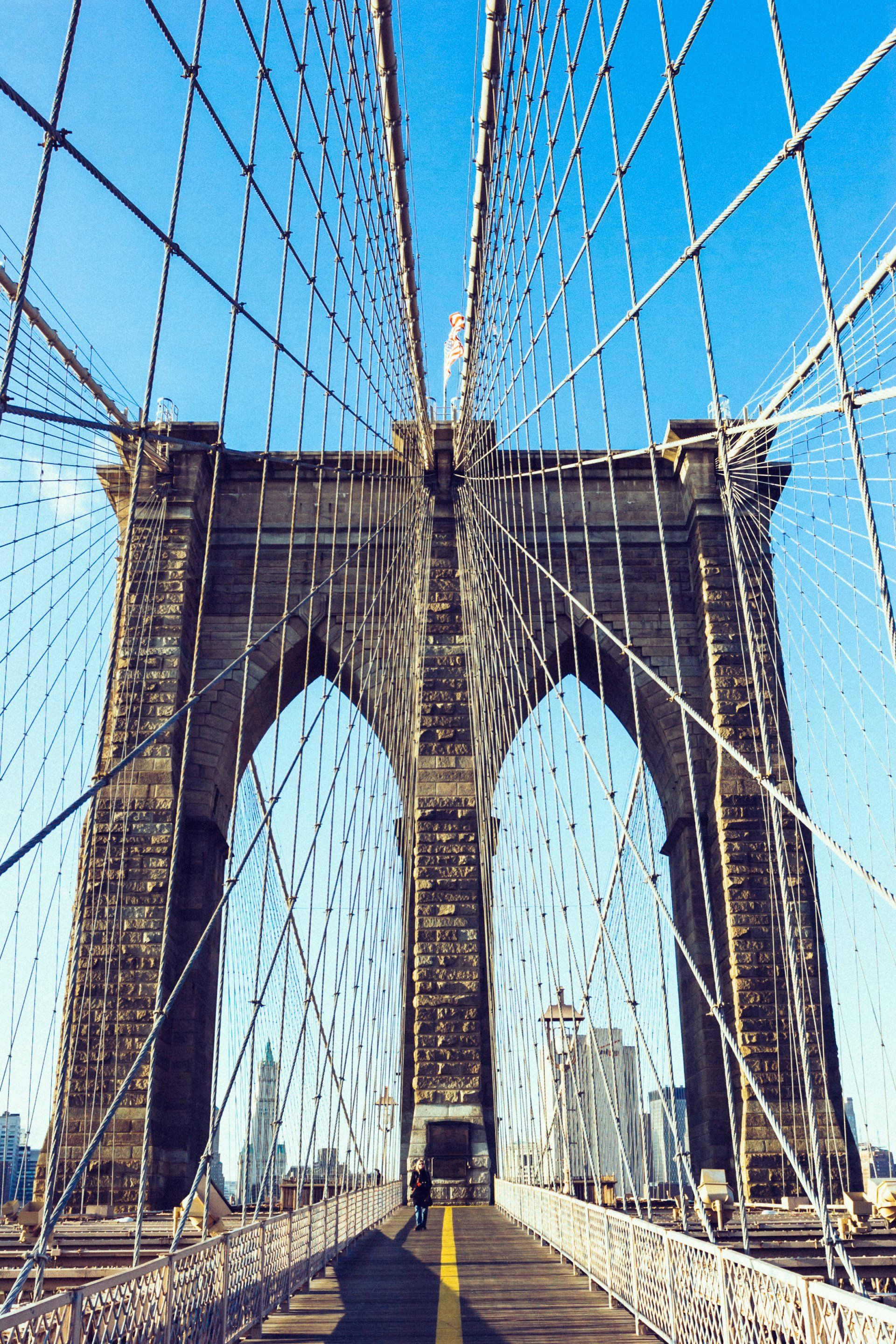 Looking up at the brooklyn bridge in new york city