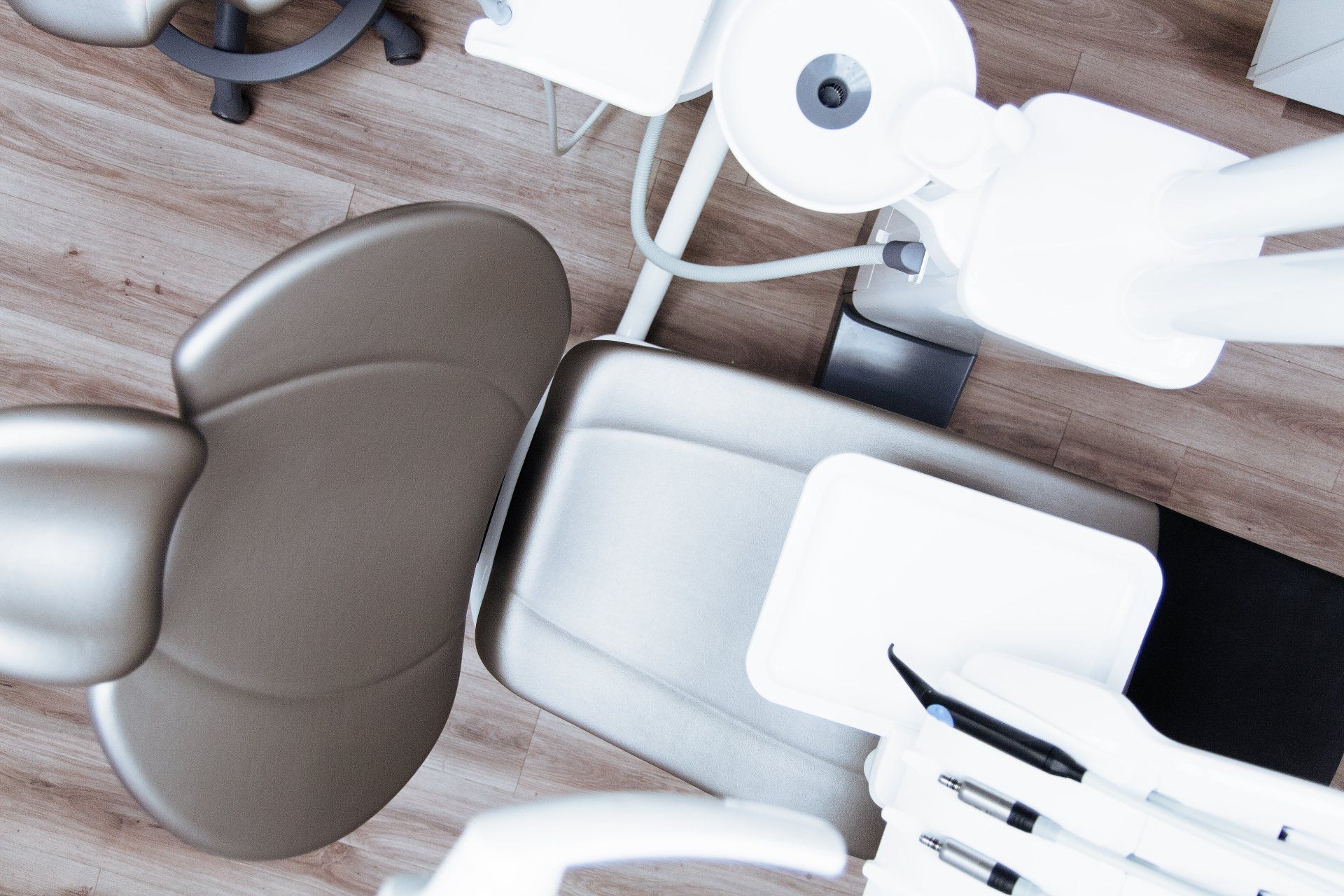 an aerial view of a dental chair in a dental office .