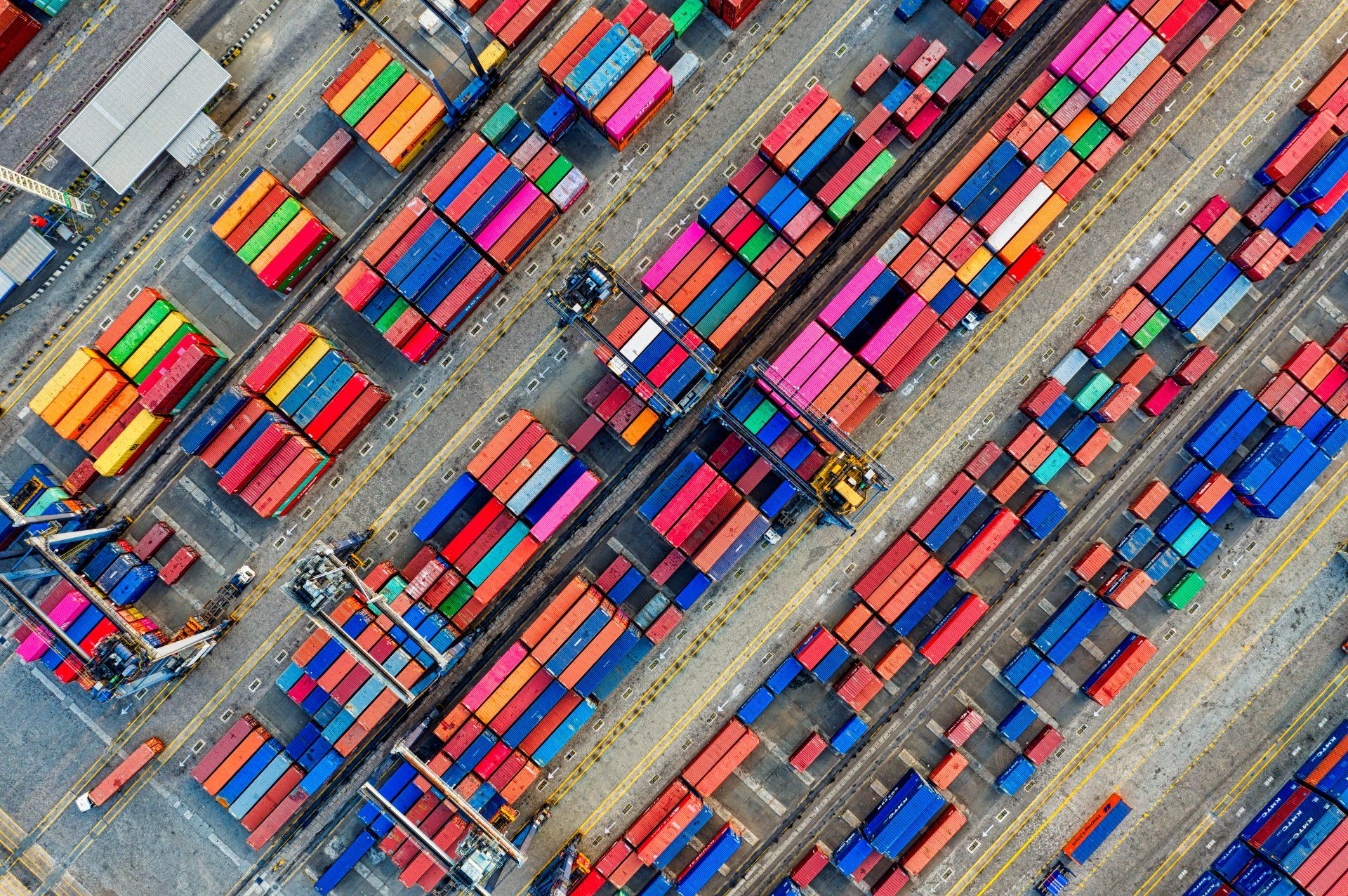 A birds-eye-view of shipping containers at a port