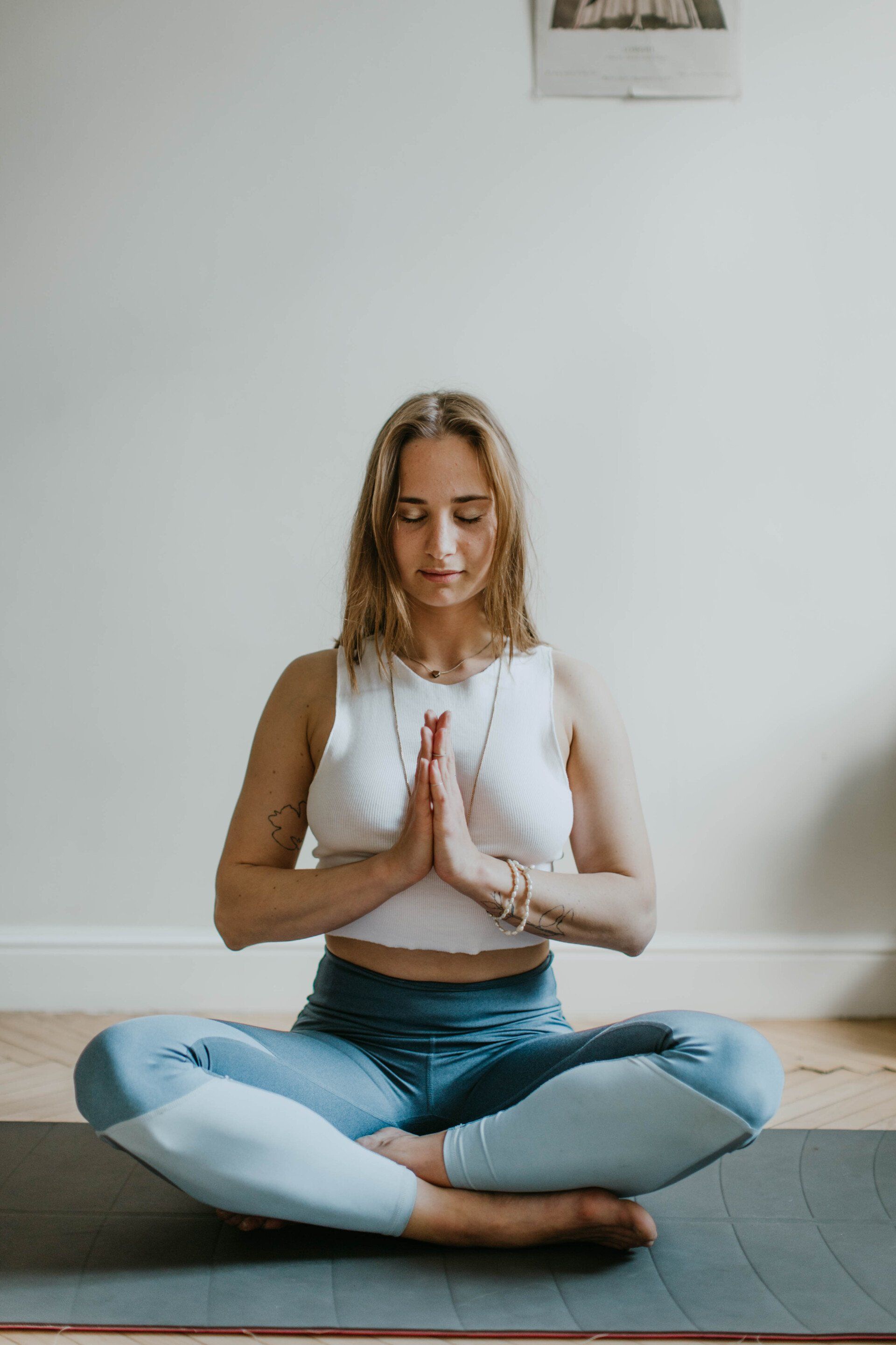 woman in calming yoga posture