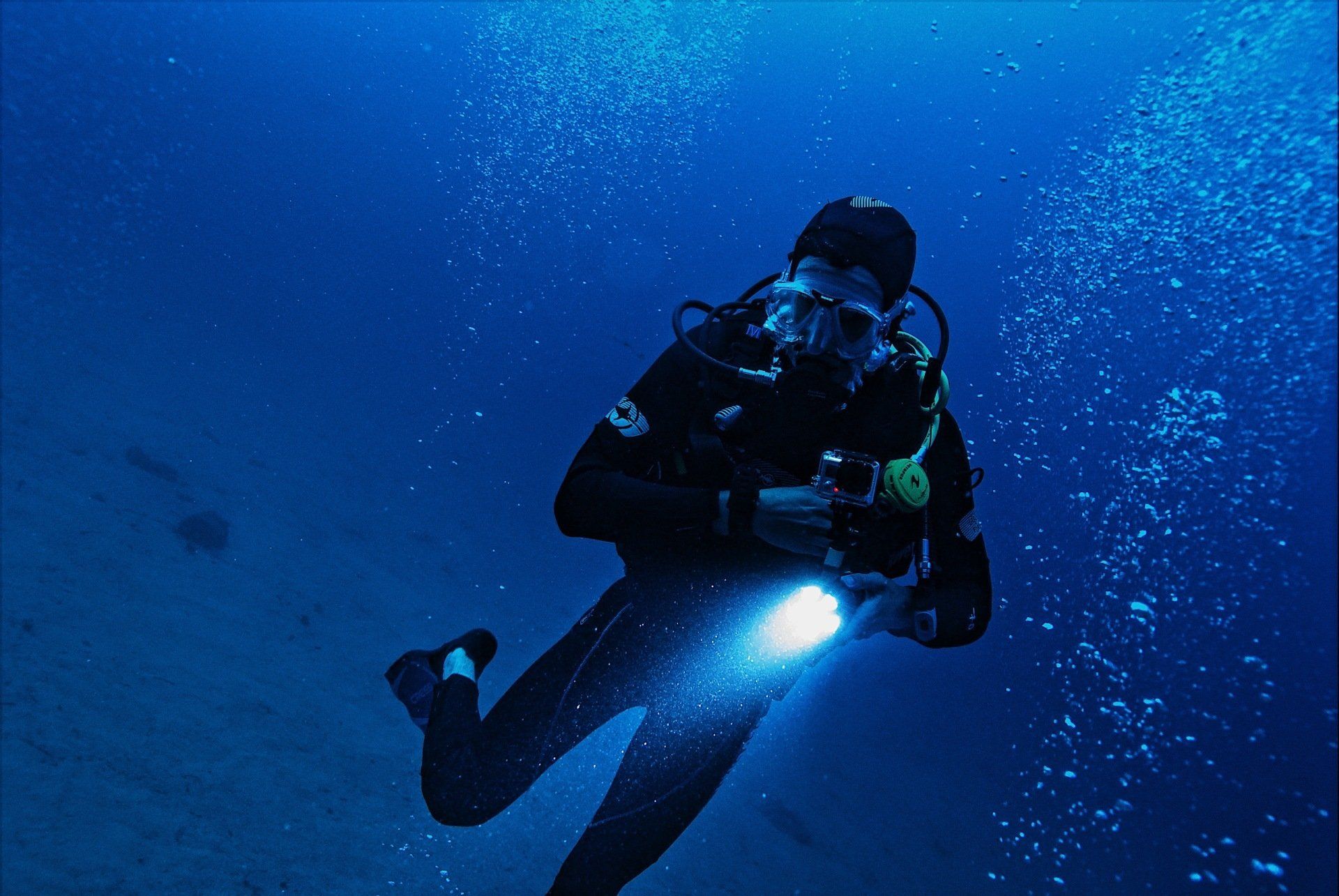 scuba diver with flashlight