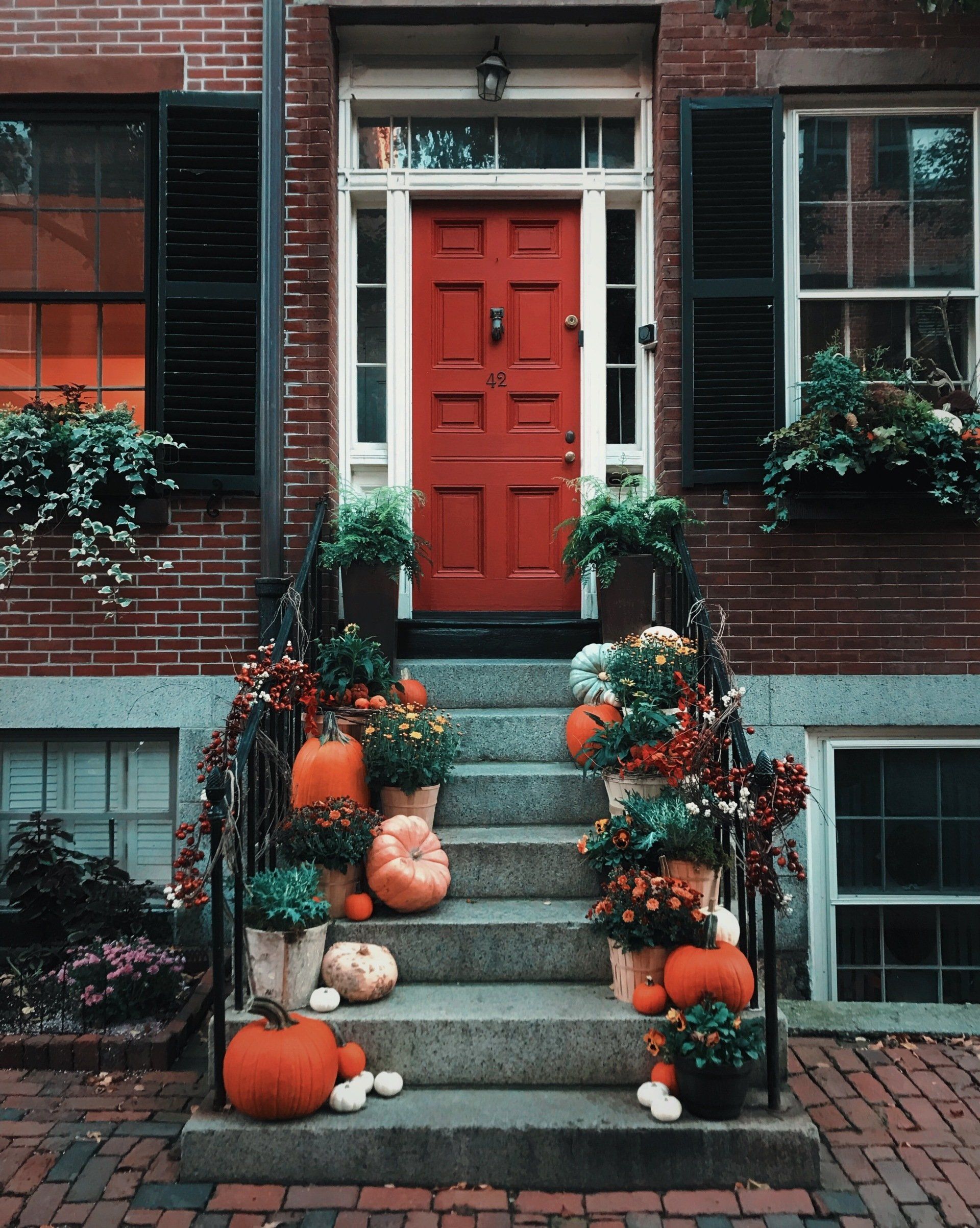 stair and front door with Halloween decors