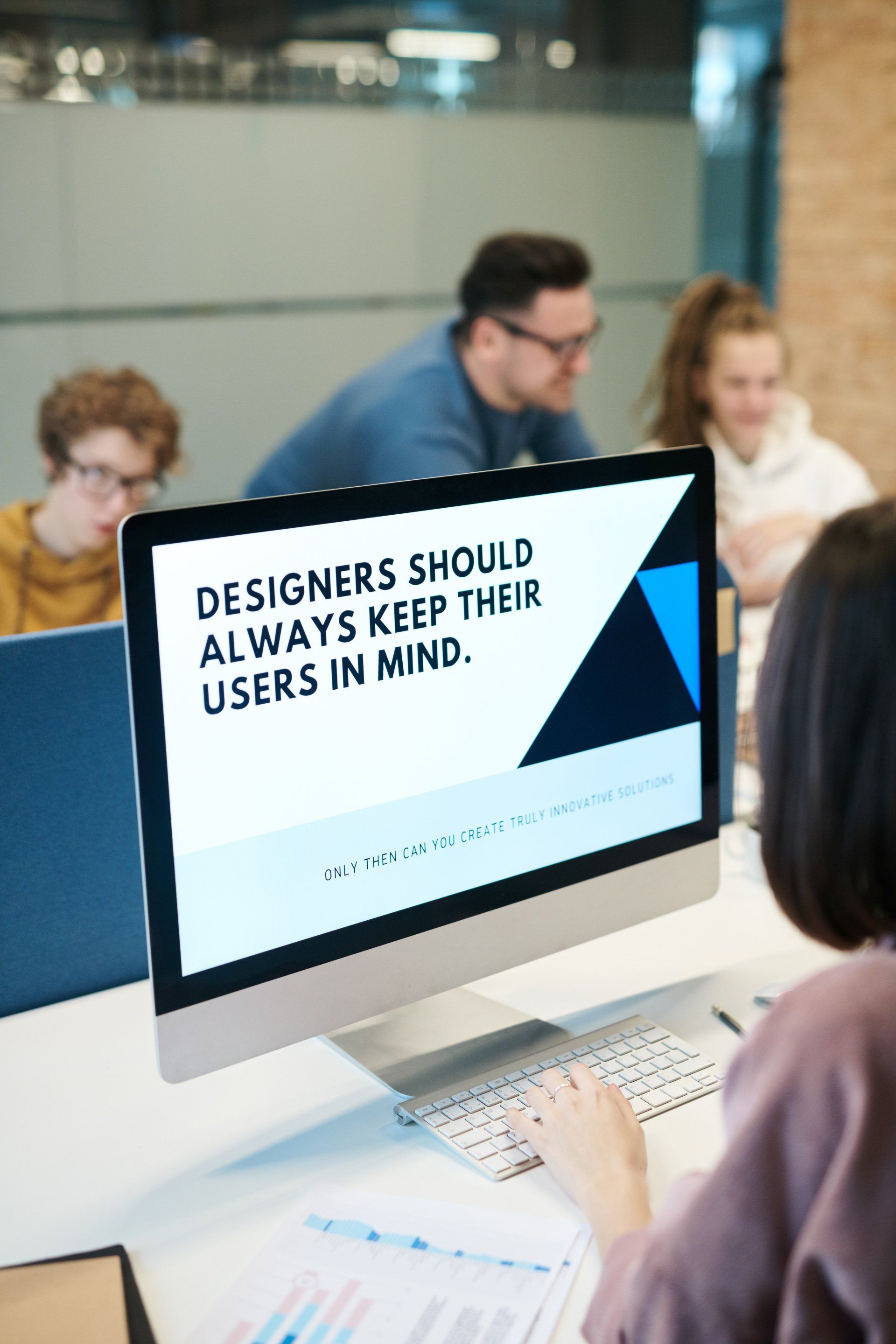 A computer screen says designers should always keep their users in mind