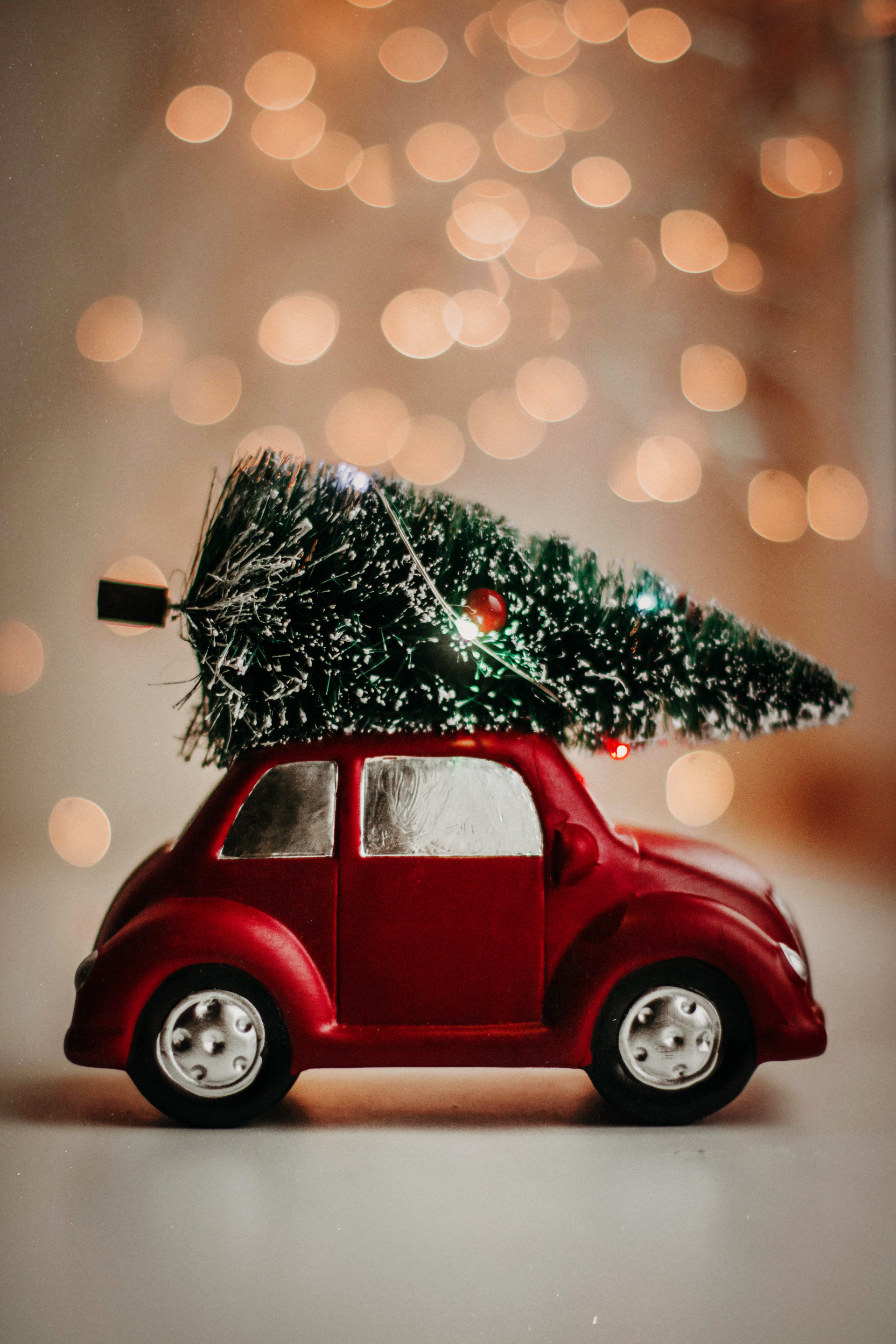 Christmas tree on a top of a toy car