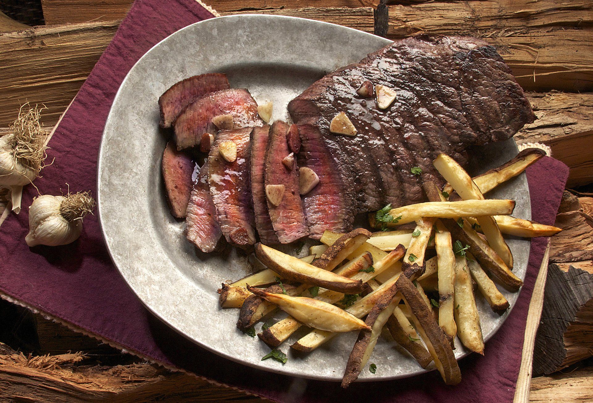 photo of steak and fries on a plate