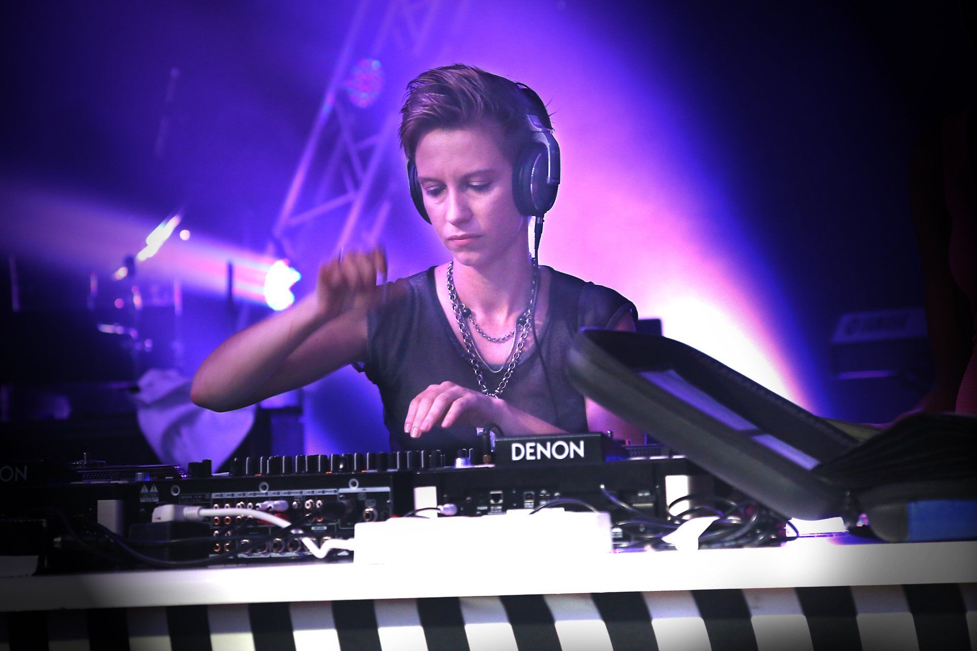 DJ Wearing Headset on Stage