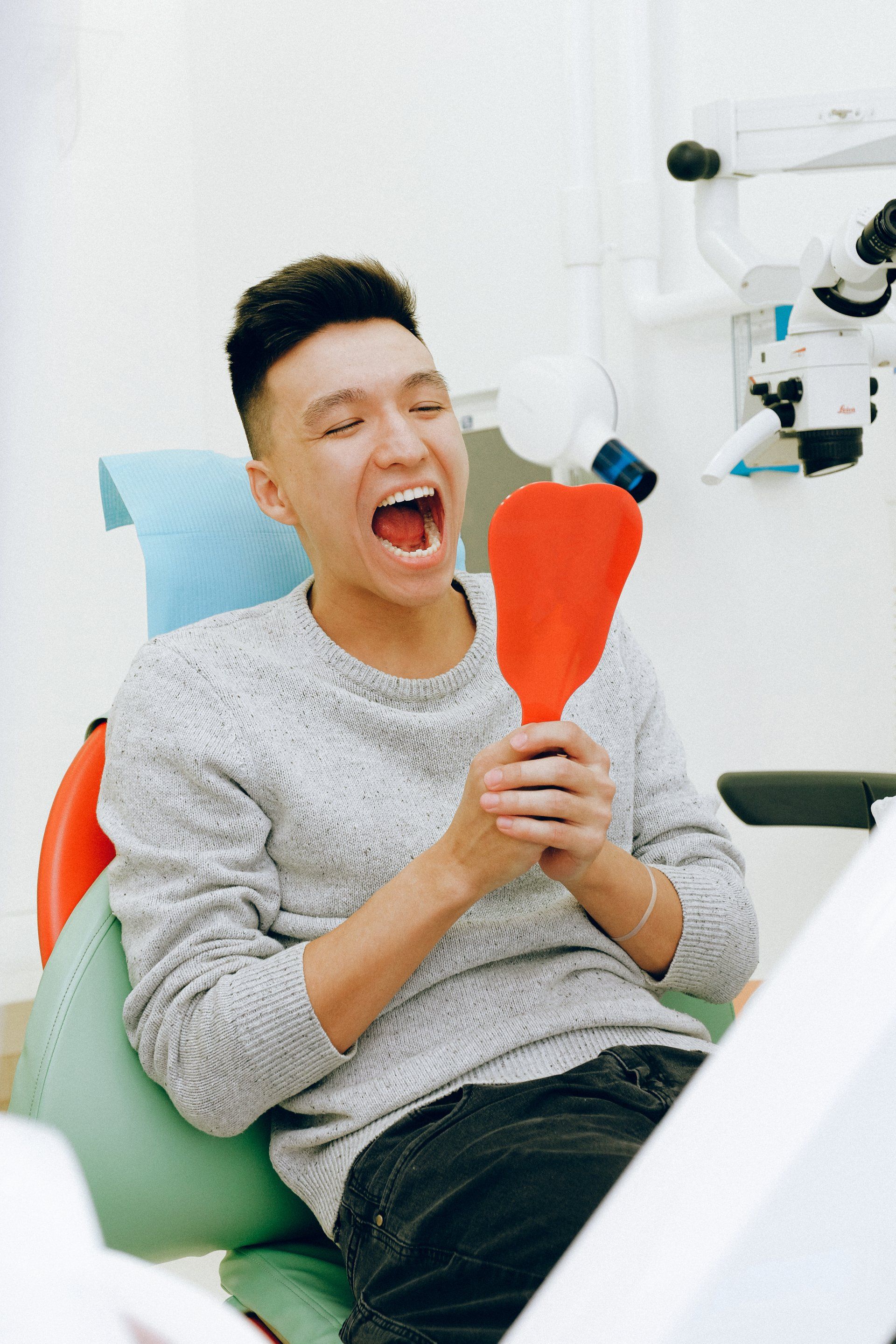 Patient taking a dental exam