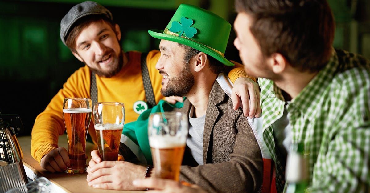 3 men with beer celebrating St. Patrick's Day - Gainesville, FL