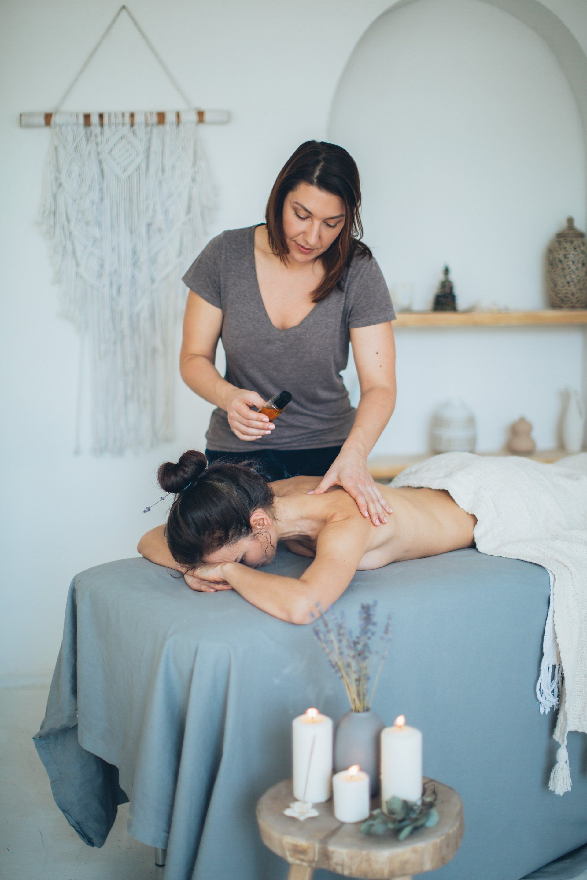 a woman is getting a massage at a spa .