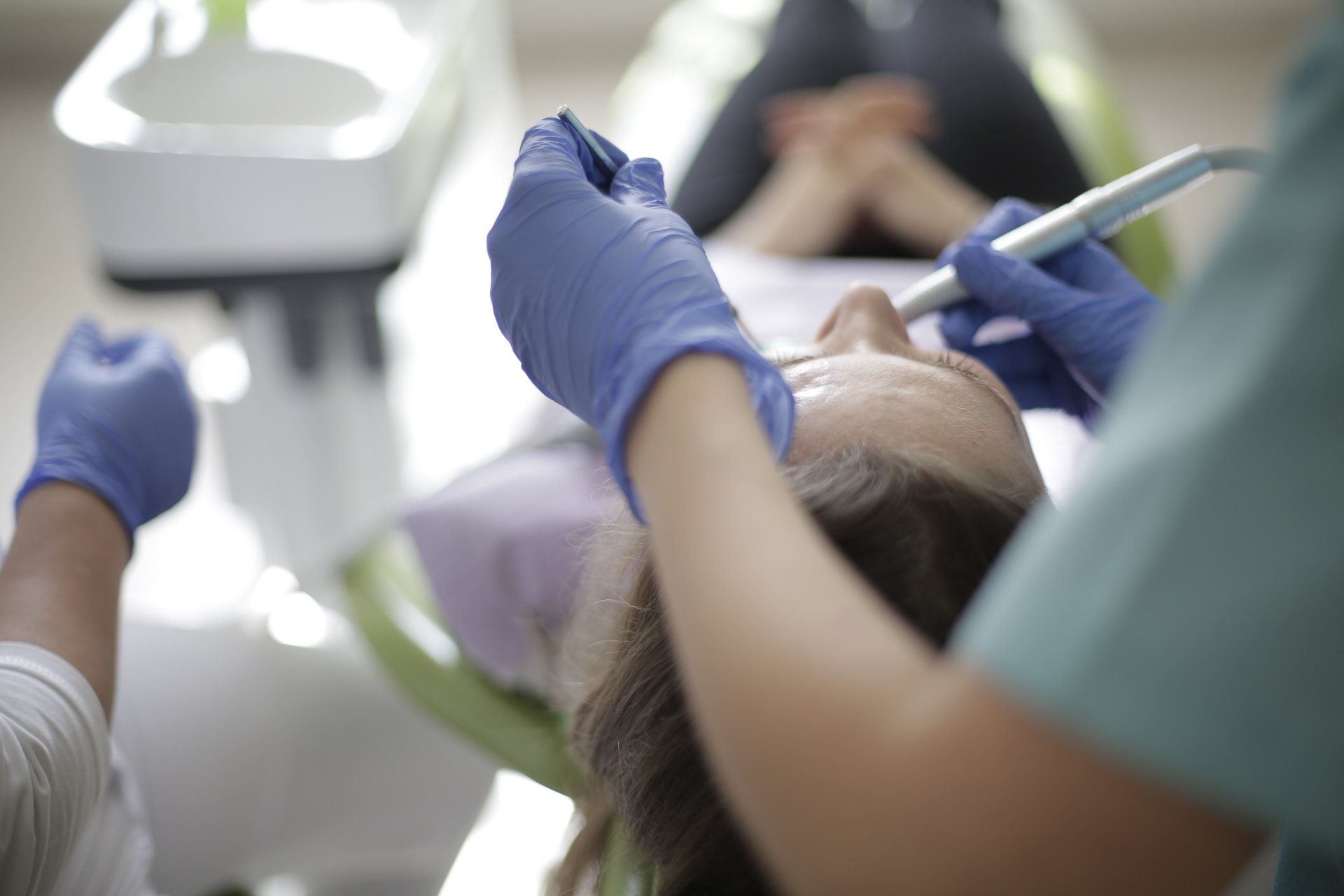 Doctor meticulously repairing a denture