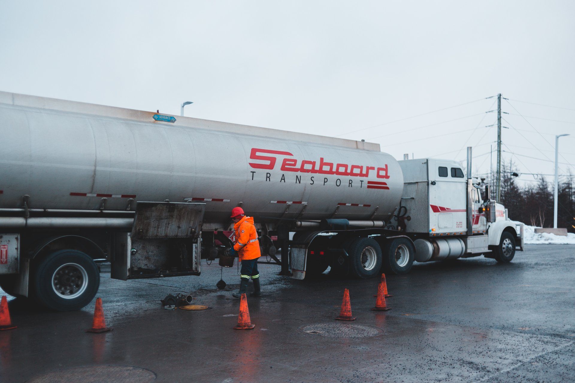 An oil truck delivering the fuel that furnaces often burn