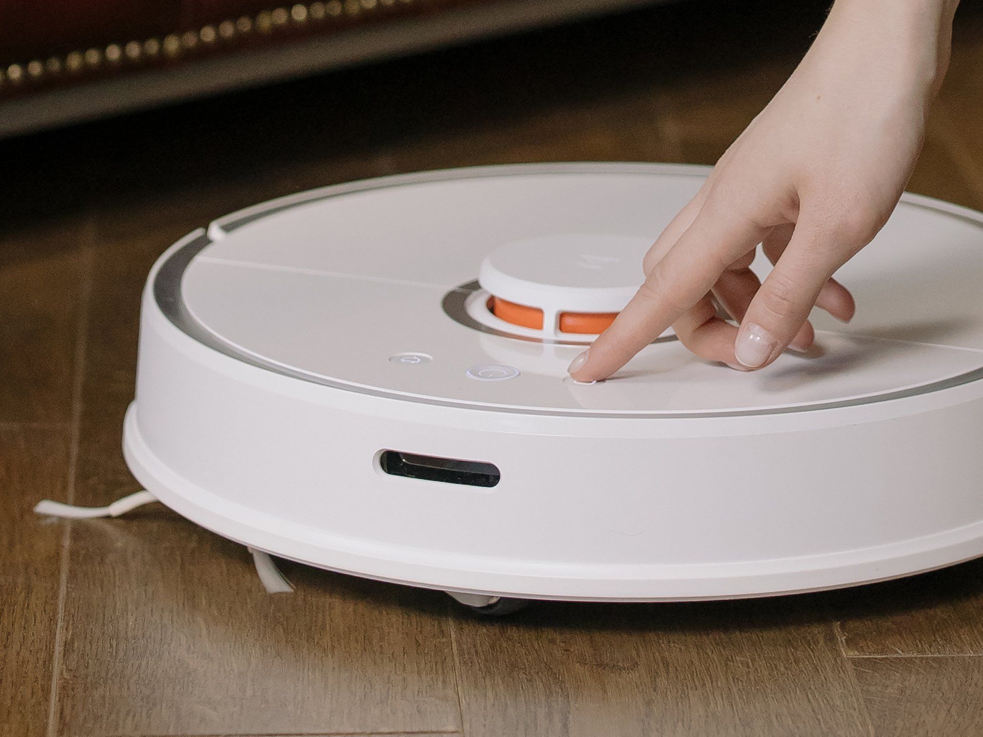 a robotic vacuum cleaner being operated