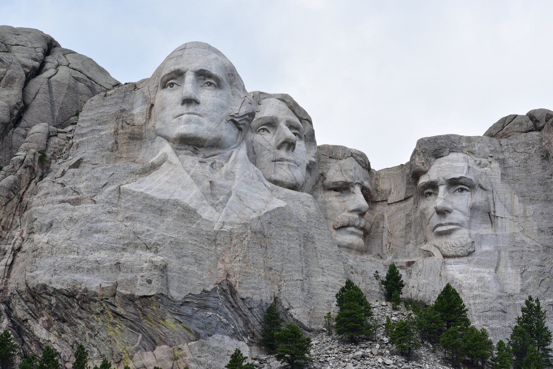 The four presidents of the united states are carved into the side of a mountain.