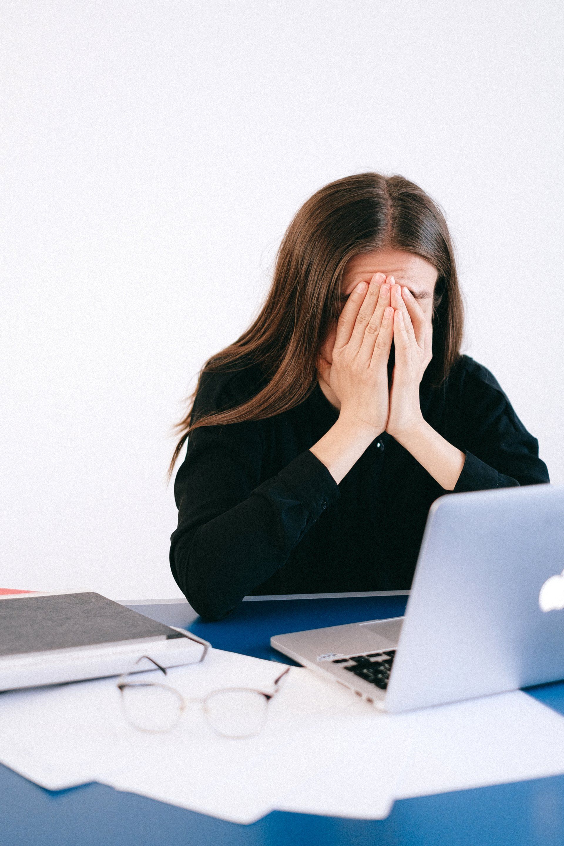 distressed woman sitting 