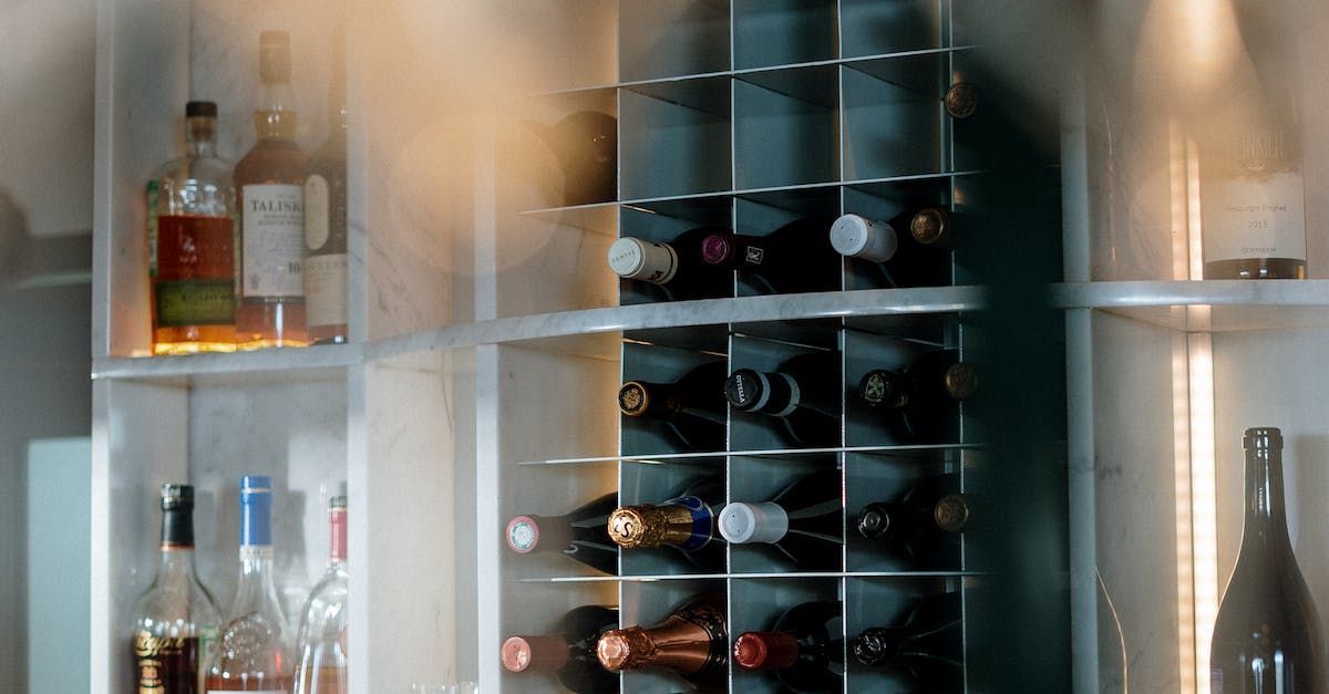 A blurred image of a wine rack filled with bottles of wine