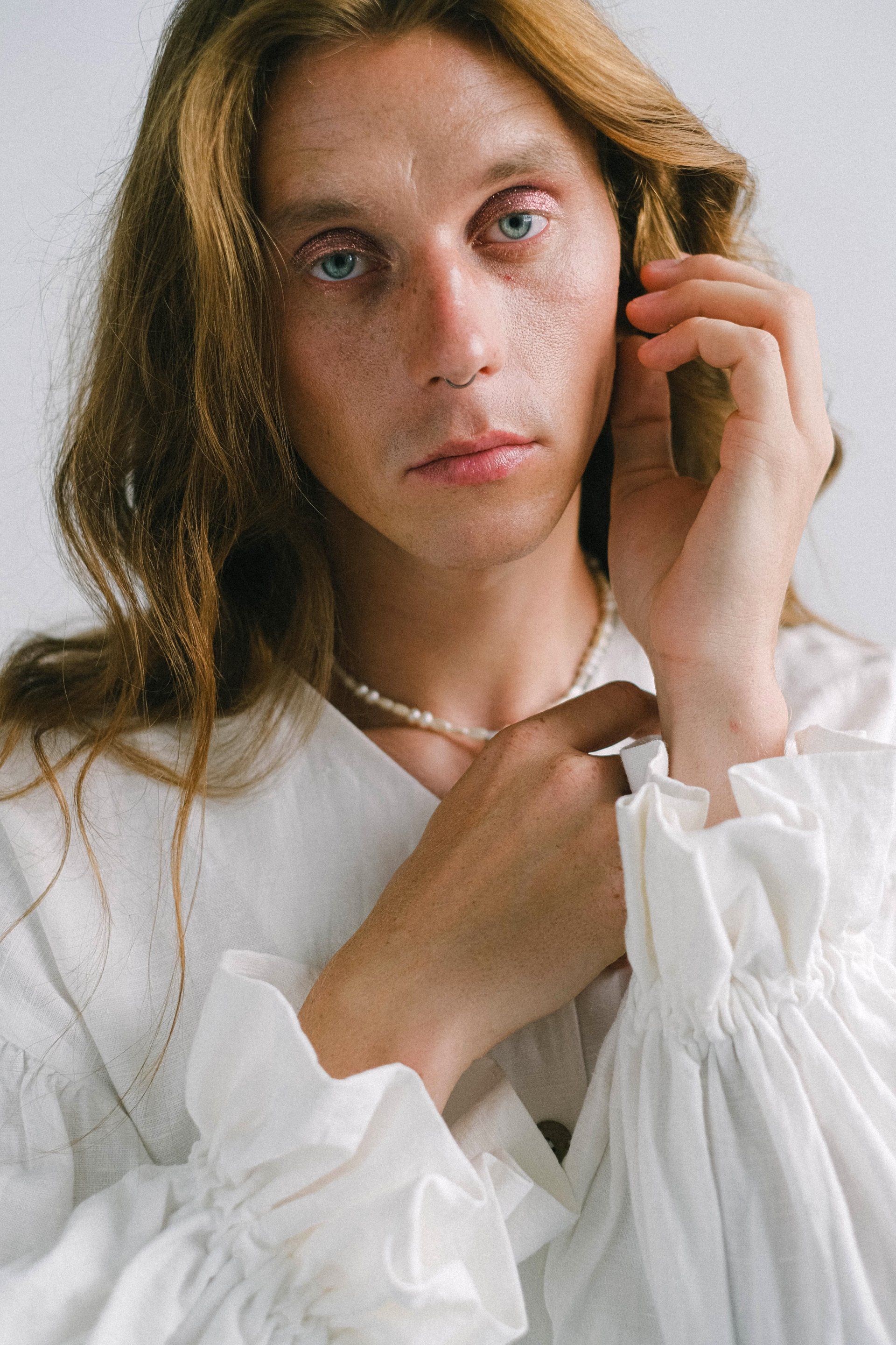 Close-up photo of a man's face after successful masculinization surgery, highlighting a more masculine jawline and facial structure.