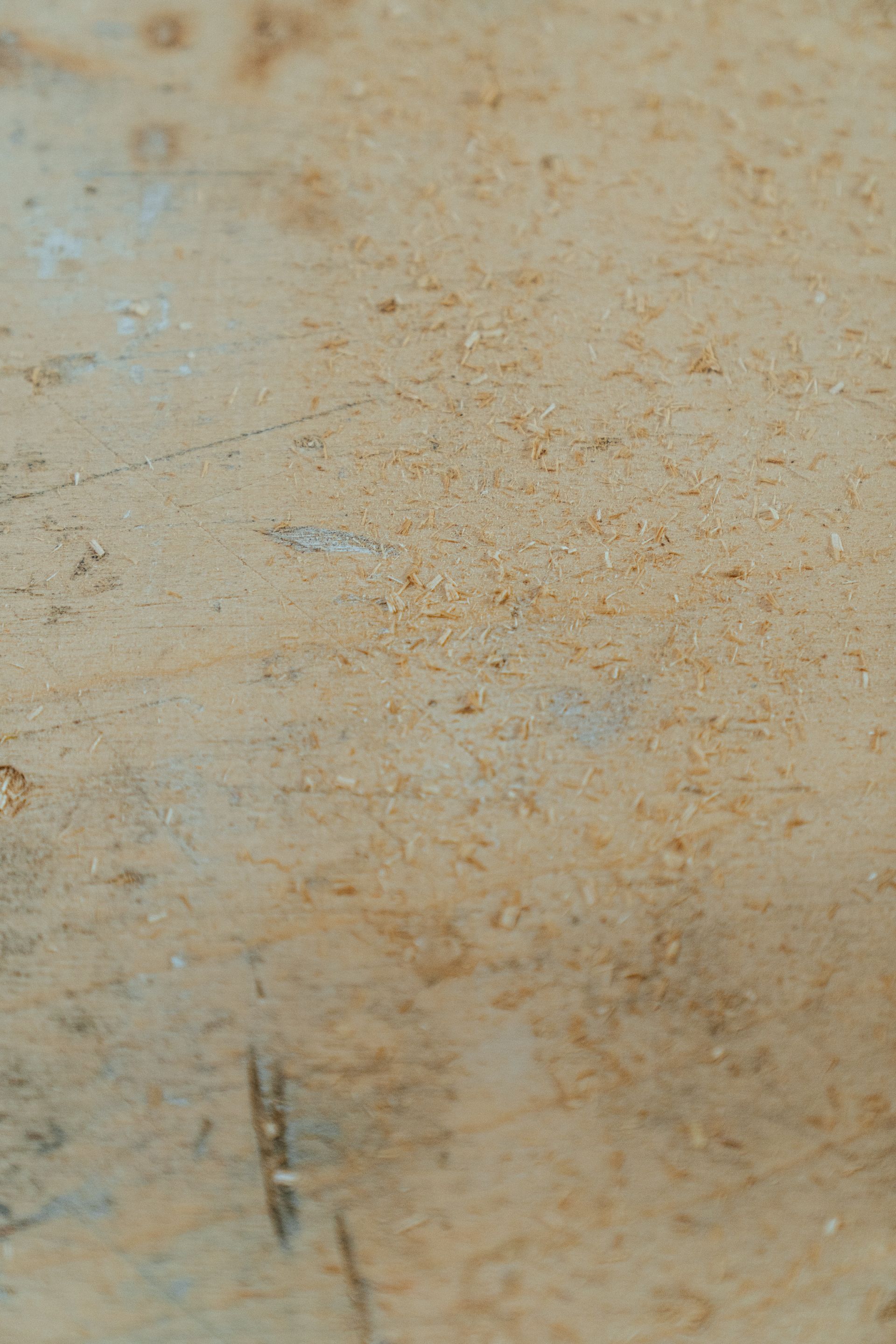 A close up of a concrete surface with a grainy texture.