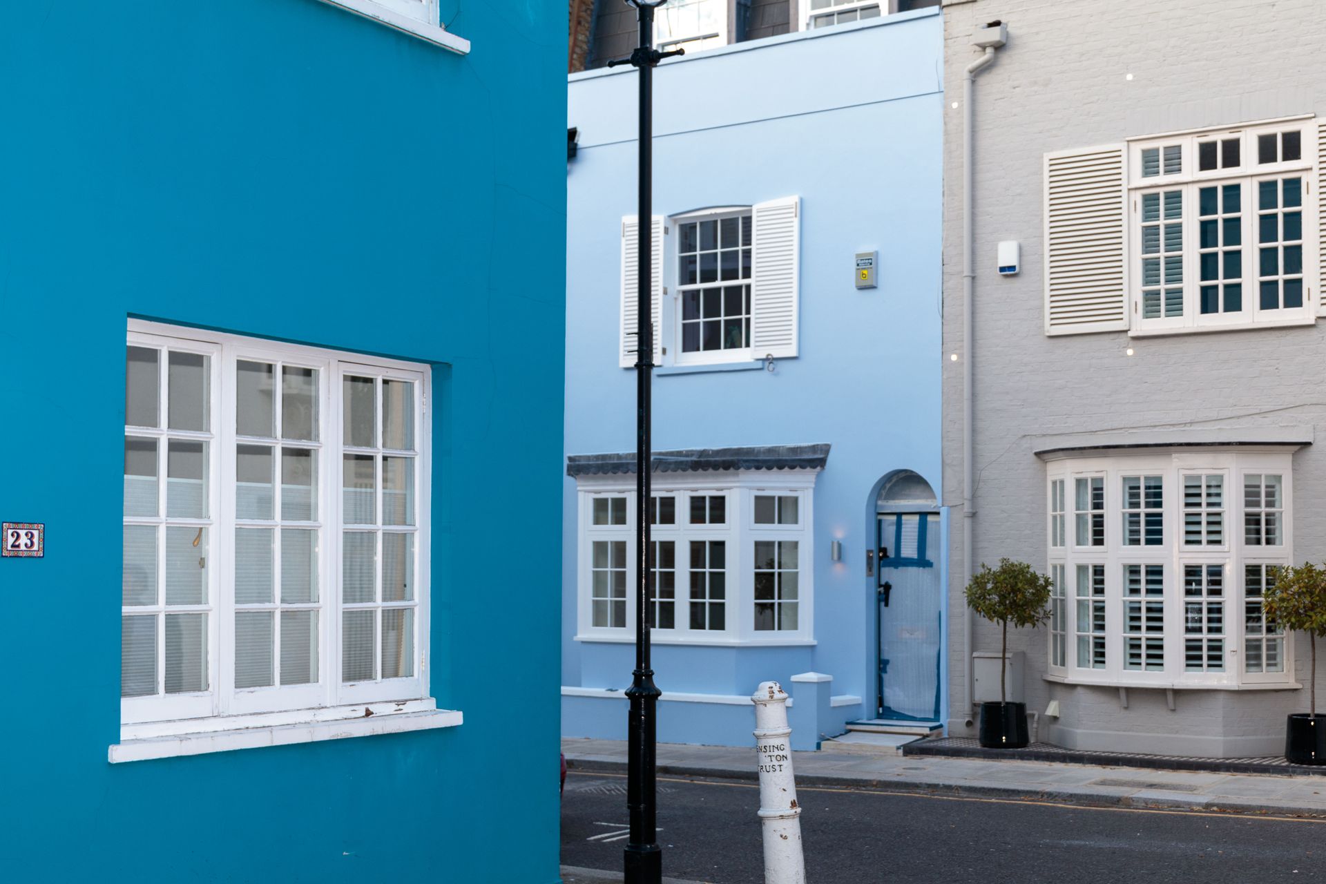white, light blue, and blue houses