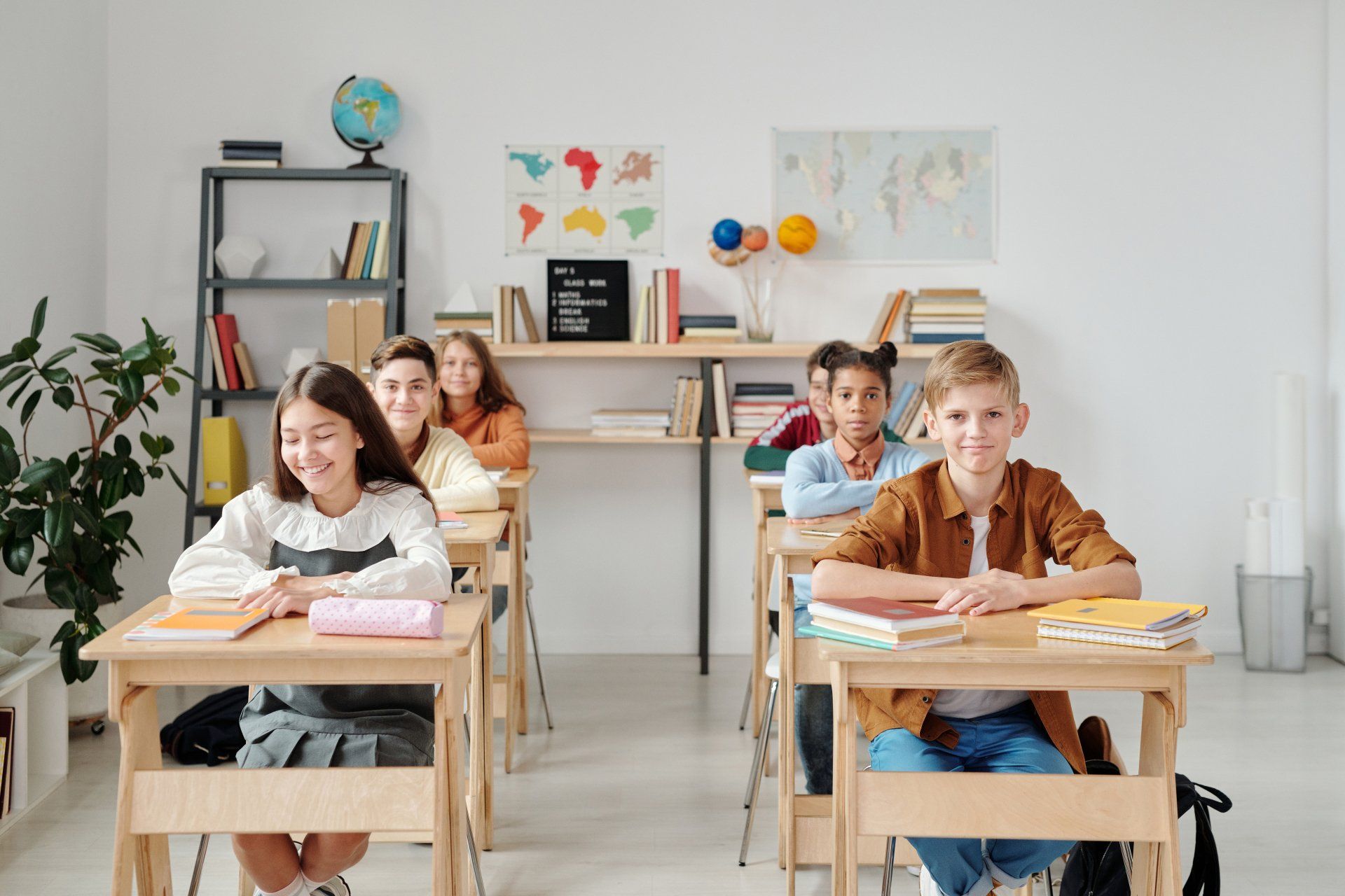Kids sitting at desks in a classroom