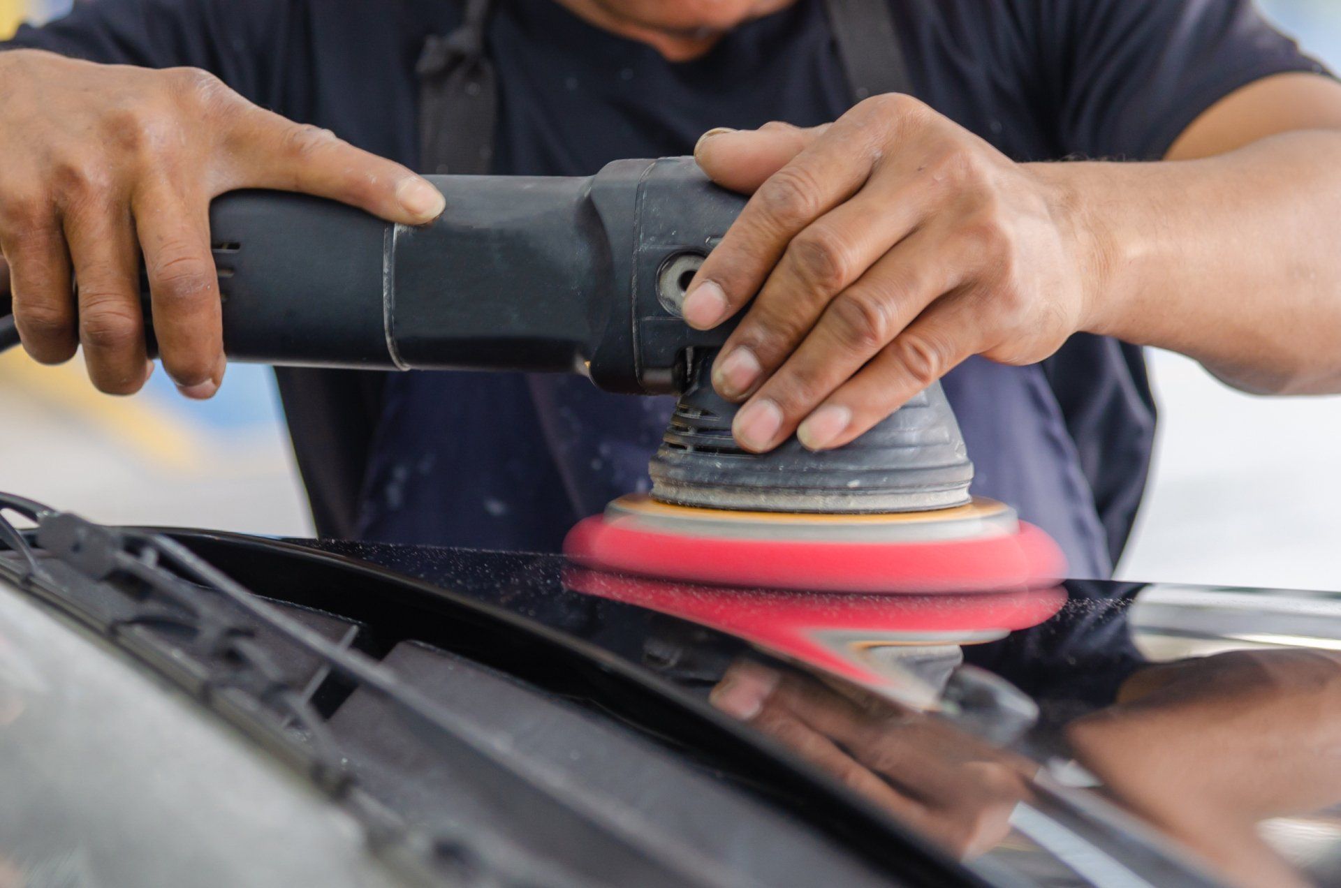 polishing a car