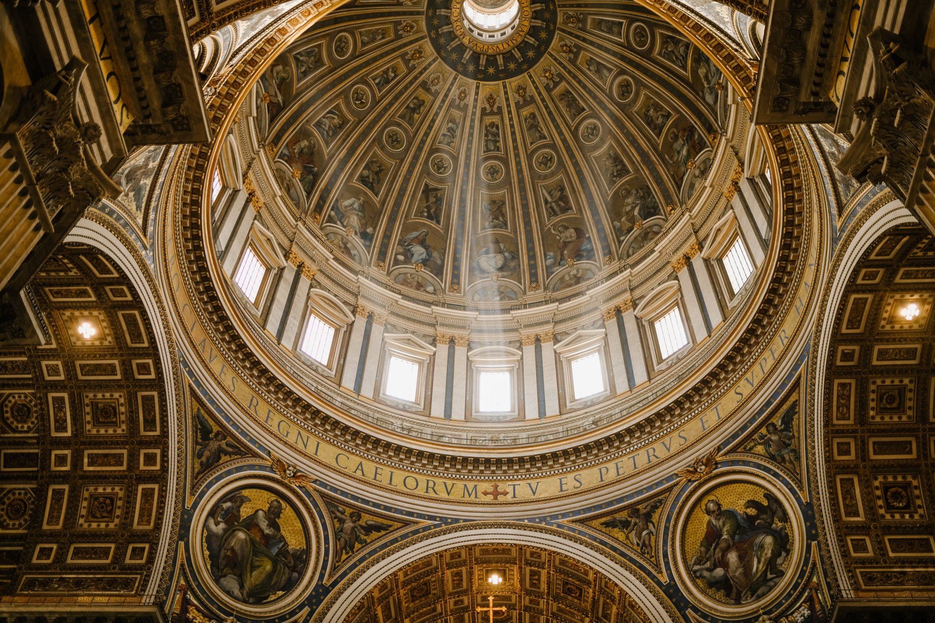 Looking up at the dome of st. peter 's basilica.