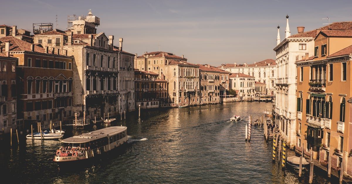 A large body of water surrounded by buildings in a city.