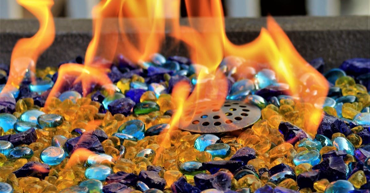 A fire pit made with concrete, burning embers