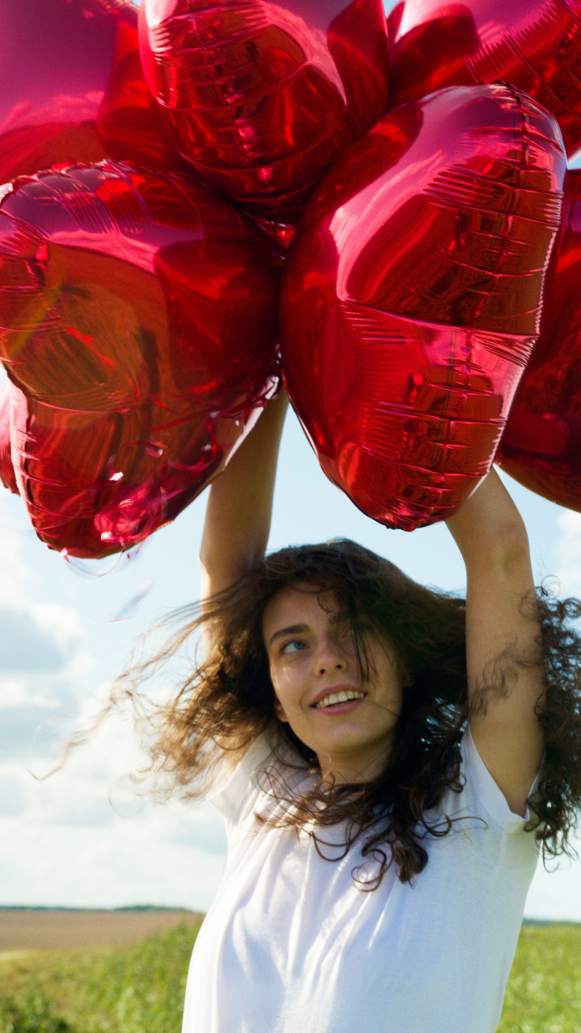 Woman with Heart Baloons